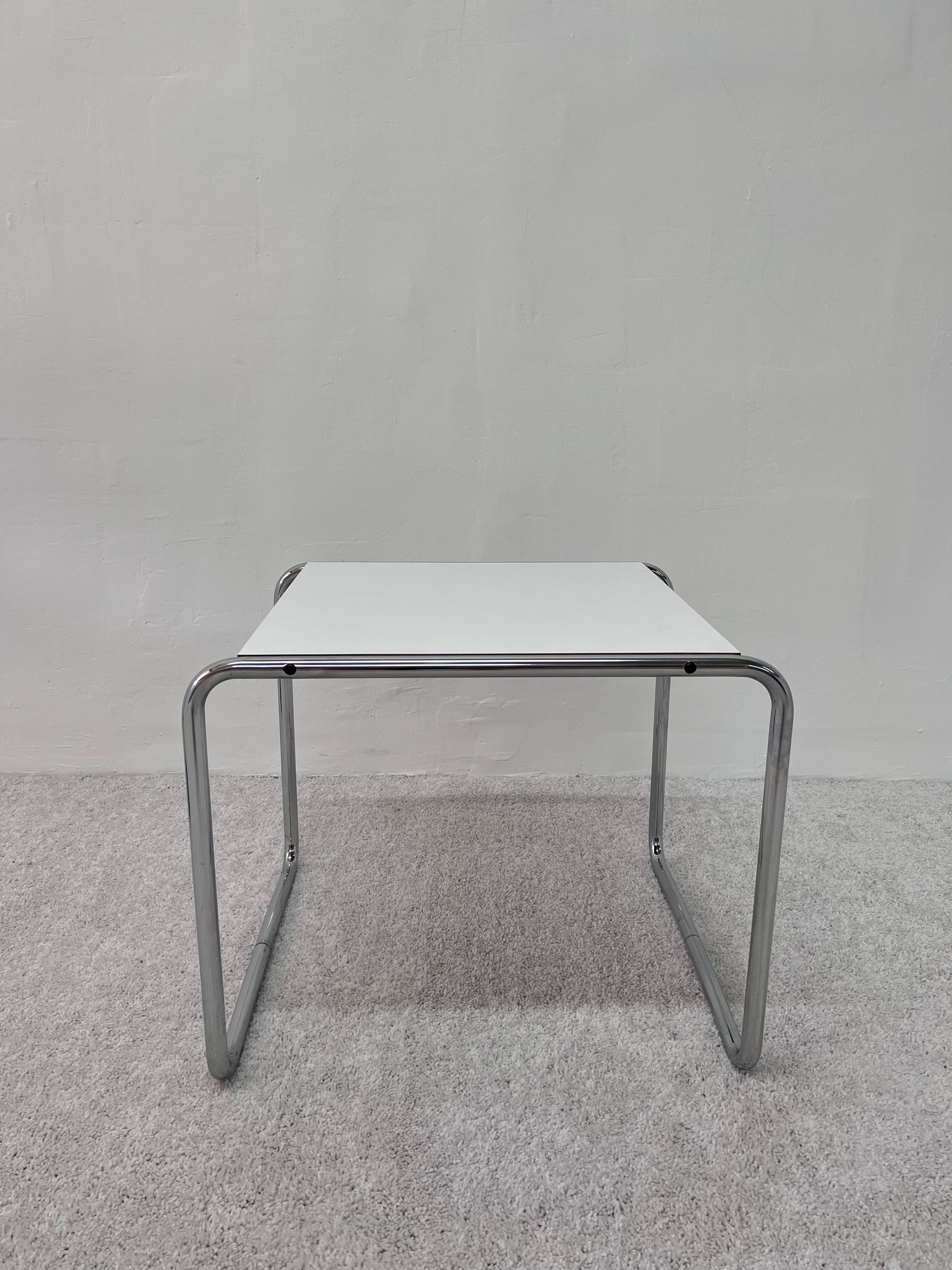 Original white laminate with chrome tubular leg side table designed by Marcel Breuer for Gavina.