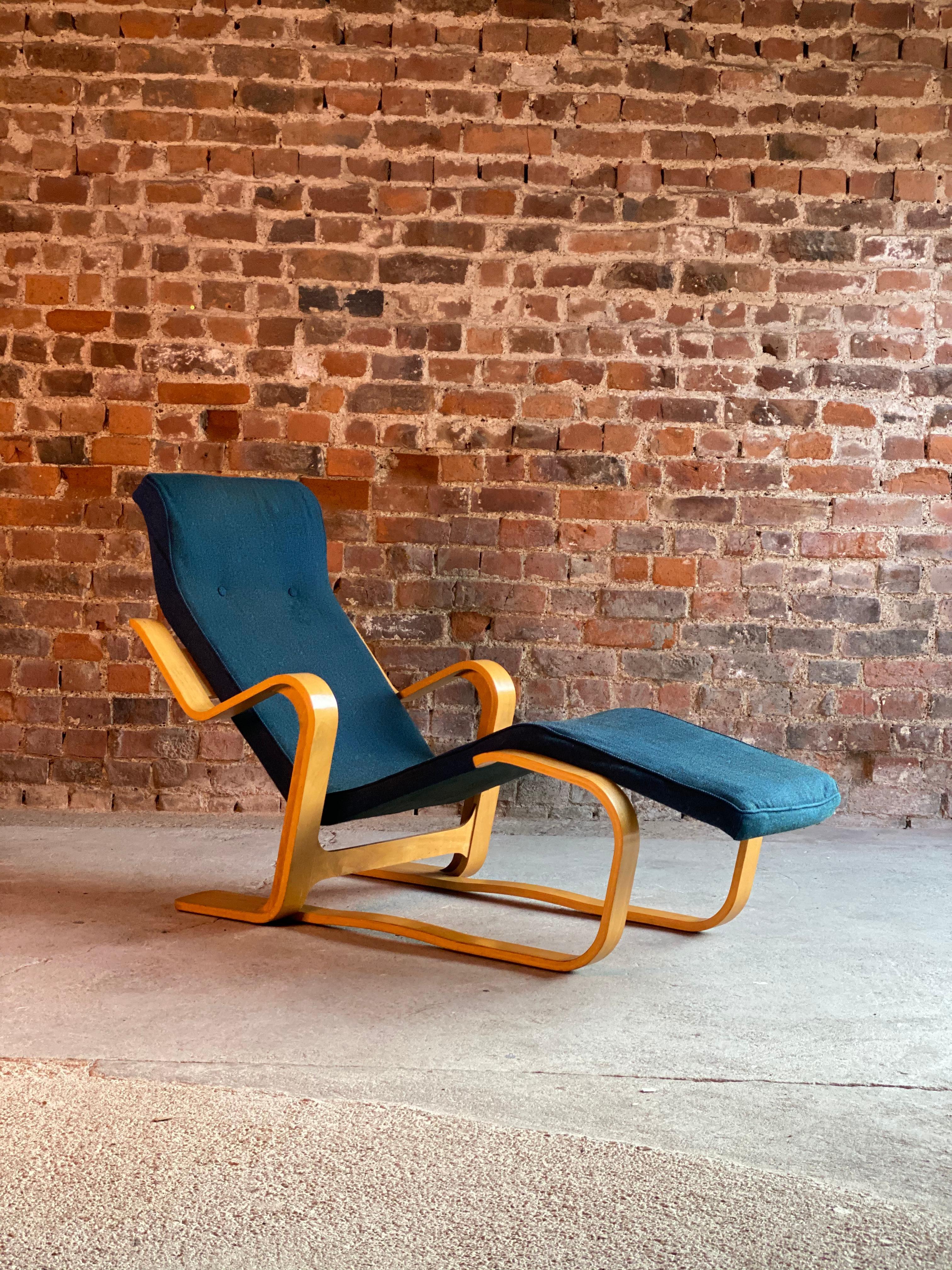 Marcel Breuer long chair by Isokon, circa 1970

Marcel Breuer 'Long Chair' Birch bent ply with a Siberian Blue Bute Tweed seat pad by Isokon circa 1970, the ‘Long chair’, with its bent frame of laminated birch wood supporting the shaped timber