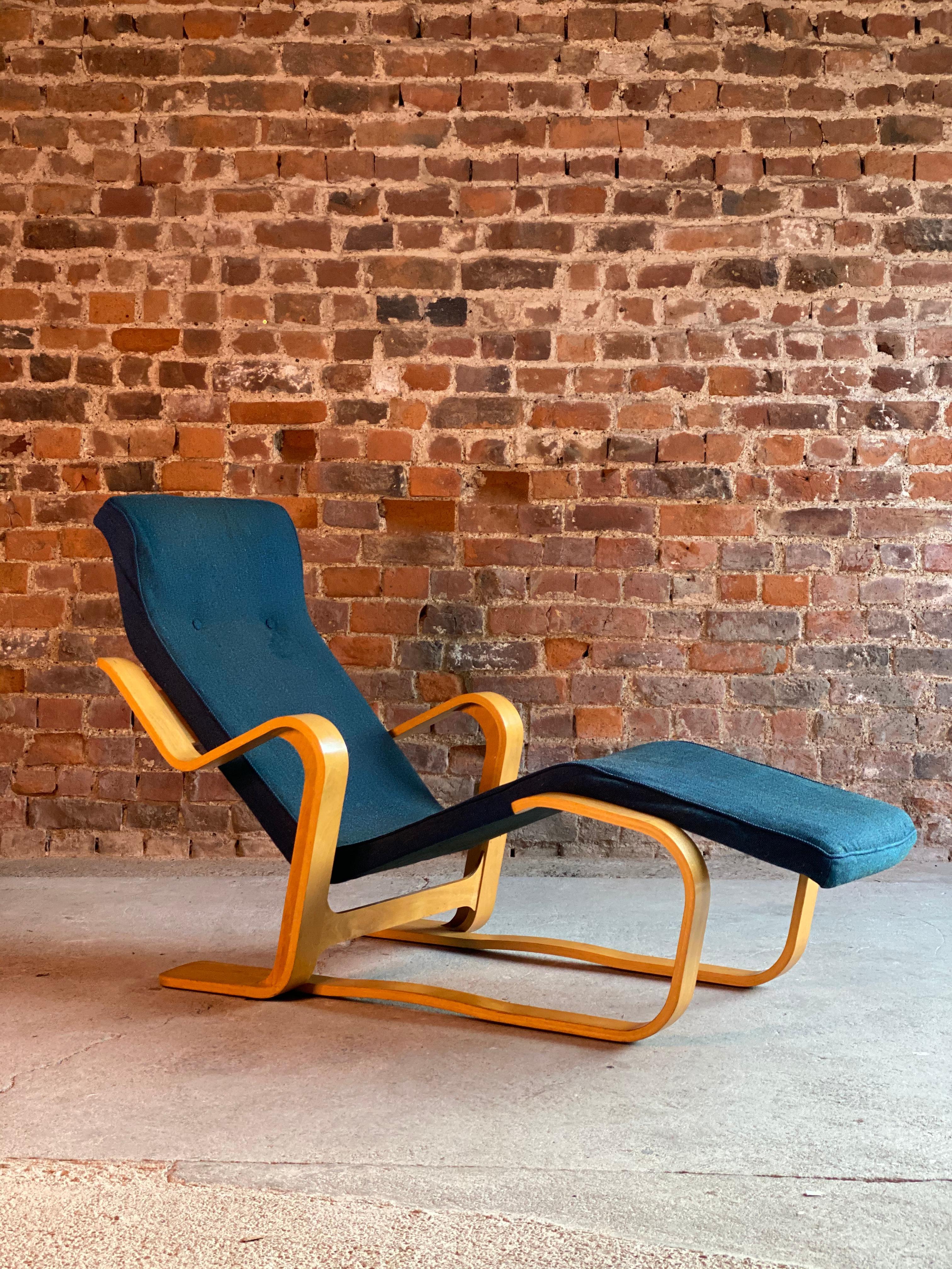 Marcel Breuer Long Chair By Isokon circa 1970

Marcel Breuer 'Long Chair' Birch bent ply with a Siberian Blue Bute Tweed seat pad by Isokon circa 1970, the ‘Long chair’, with its bent frame of laminated birch wood supporting the shaped timber seat