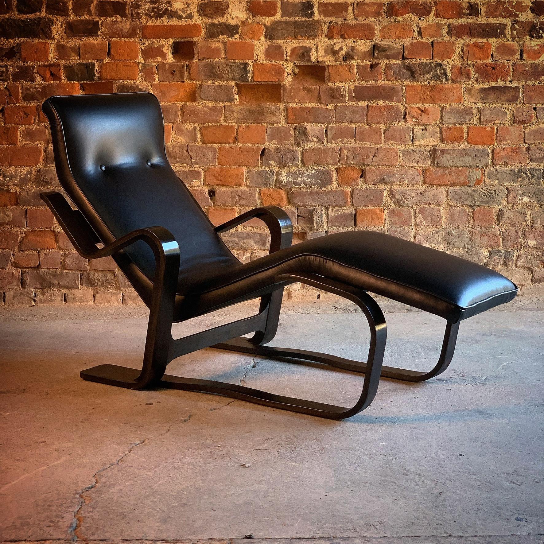 Marcel Breuer long chair chaise Lounge by Isokon, circa 1970 Bauhaus

Marcel Breuer 'Long Chair' ebonized bent ply with black leather seat pad by Isokon circa 1970s, the ‘Long chair’, with its bent frame of laminated birch wood supporting the