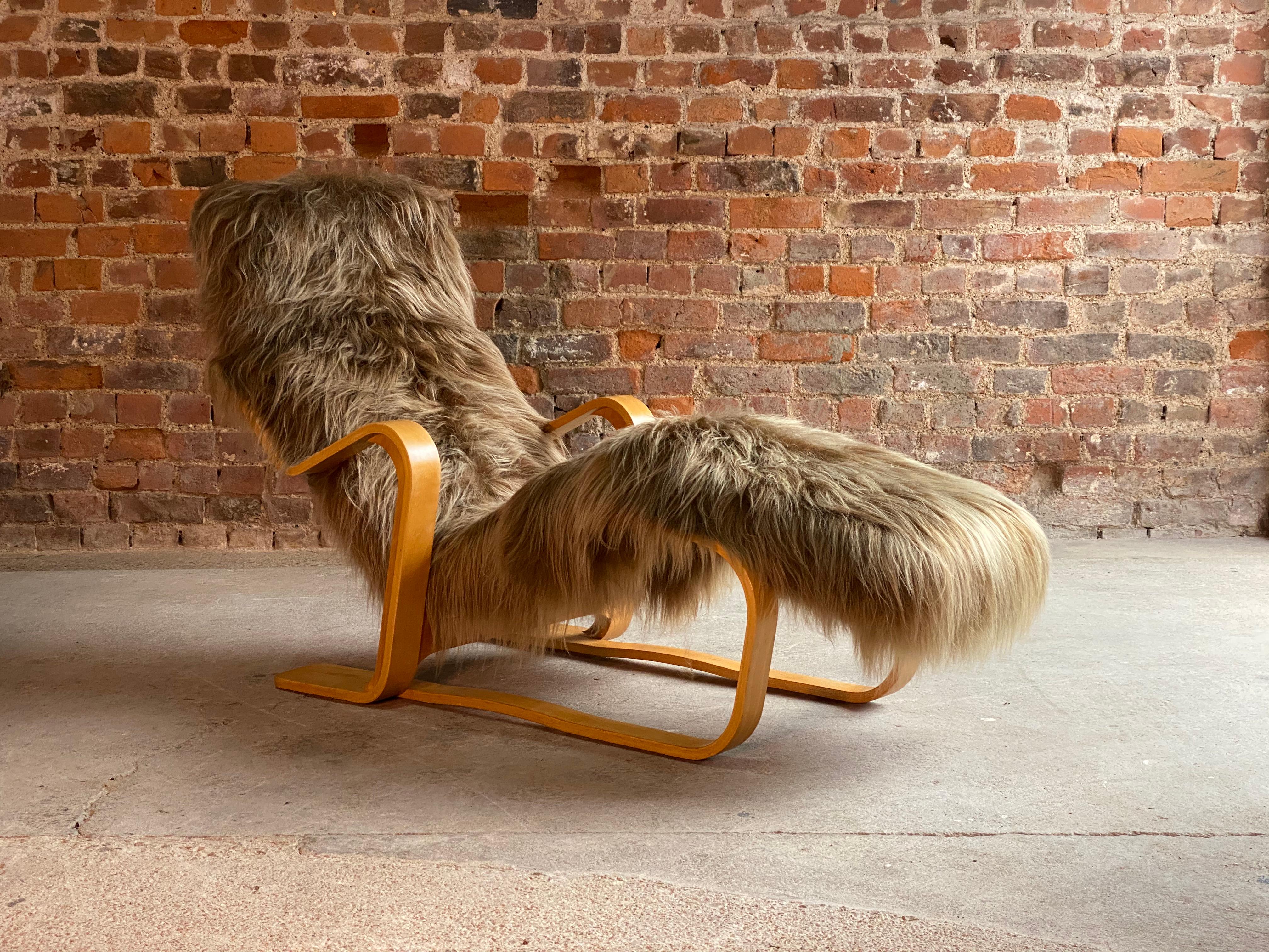 Marcel Breuer long chair in Icelandic long haired sheepskin by Isokon circa 1970 Bauhaus

Marcel Breuer 'Long Chair' birch bent ply with Icelandic long haired sheepskin hide by Isokon circa 1970s, the ‘Long chair’, with its bent frame of laminated