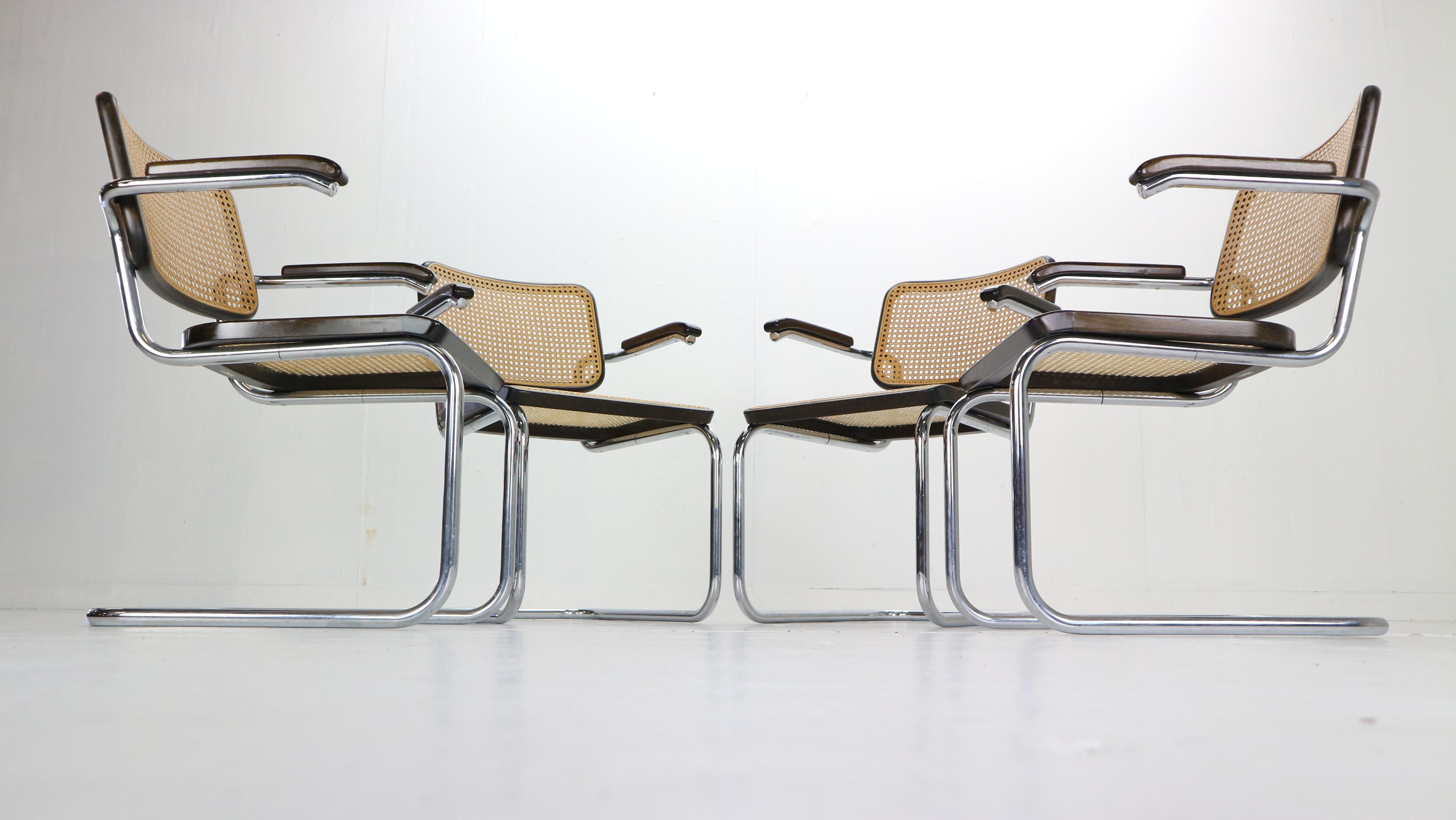 Set of 4 chair were designed by Marcel Breuer for Thonet in 1929, Austria.
Model No: S64 chairs are original (marked under the seating).

These Thonet chairs are made of chrome-plated tubular steel, dark brown and natural bentwood and a rattan