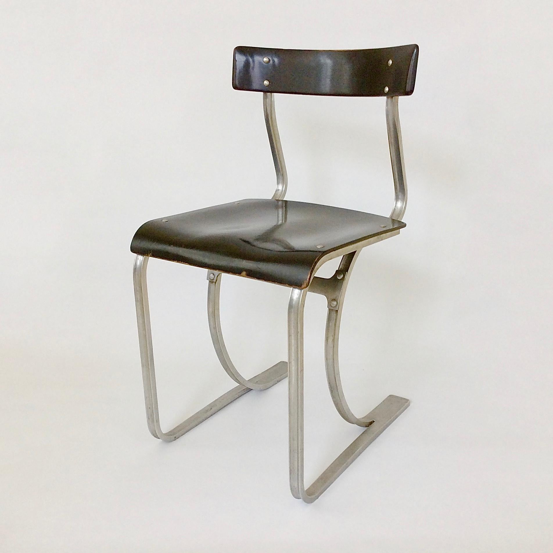 Rare Marcel Breuer (1902-1981) chair model no. WB 301, for Wohnbedarf, circa 1932.
Bent aluminium, black lacquered wood.
Dimensions: 73 cm H, 38 cm W, 42 cm D.
Good condition.
We ship worldwide.
 