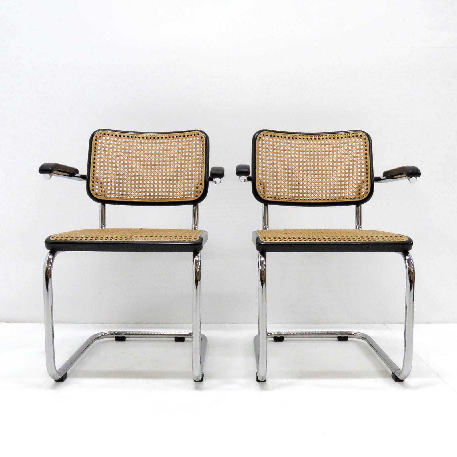Superbes exemples de fauteuils 1987 modèle S64 de Marcel Breuer pour Thonet:: en acier tubulaire avec cadre en bois peint en noir et canne pour l'assise et le dossier:: marqués.