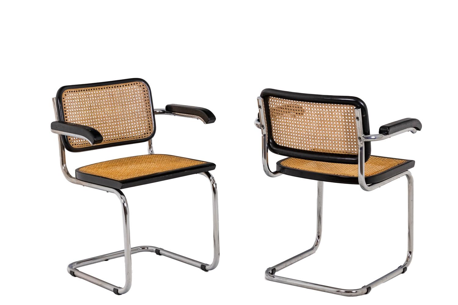 Marcel Breuer, attributed to. 
 
Series of four cesca armchairs. The seat, backrest and armrests in black lacquer and trimmed with natural blond cane are fixed on a tubular structure with round section in chromed and folded steel. 

Work