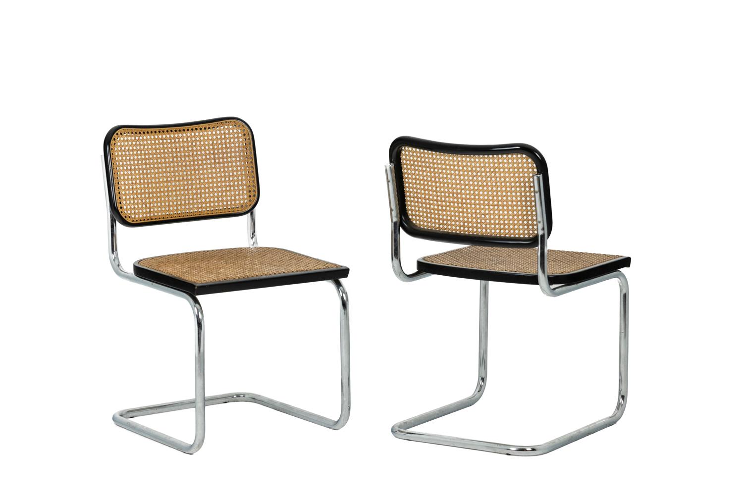 Marcel Breuer for Cidue, edited by.

Series of six caned chairs, model B32 in black lacquered wood. Seat and back in black lacquer and filled with blond natural canning are fixed on a tubular structure with a round section in chromed and folded