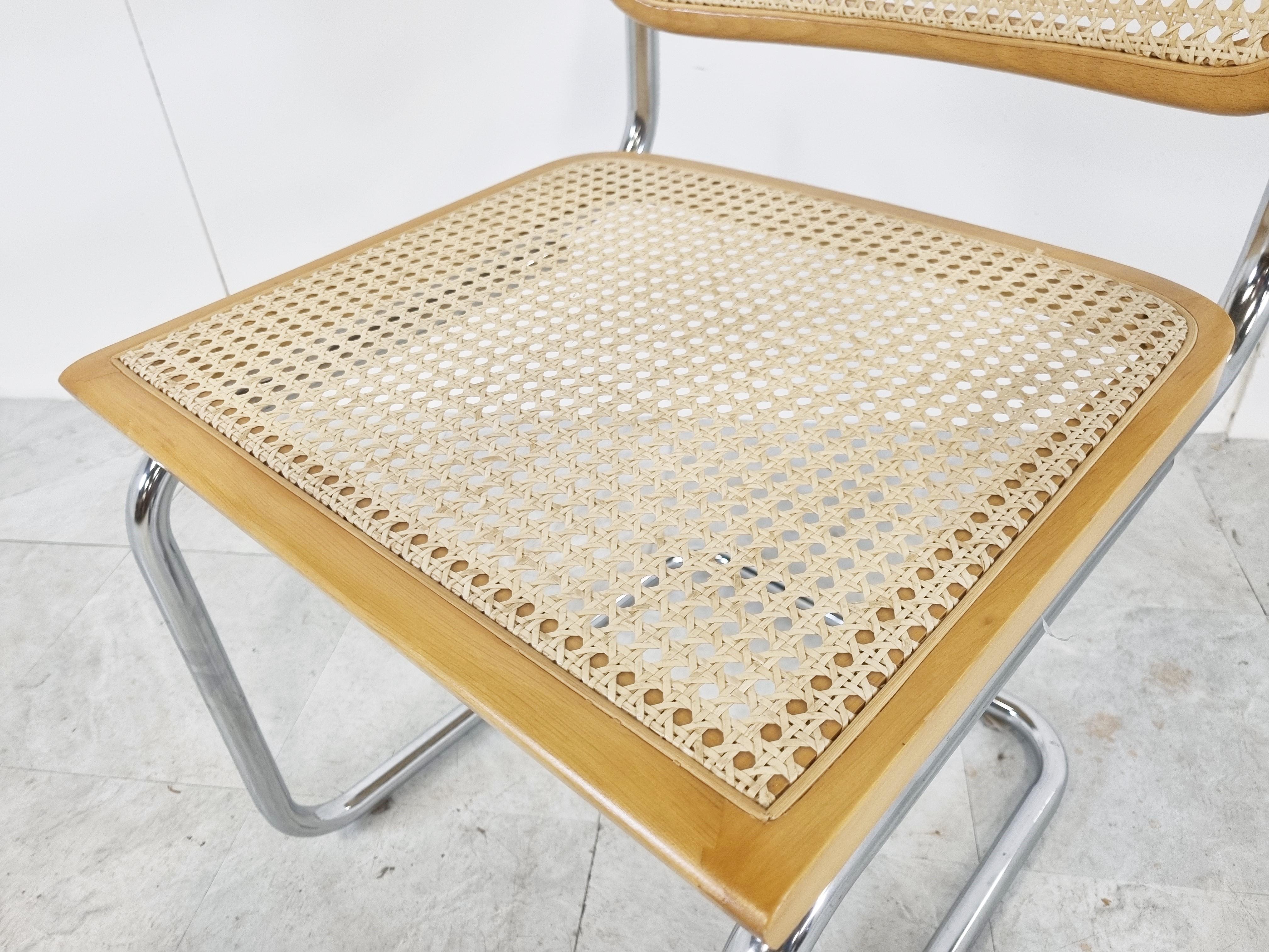 Beautiful bauhaus style 'cesca' armchairs, original design by Marcel breuer.

Timeless cantilever design with beech wooden and woven rattan seat and backrest and chromed tubular steel frame.

Great as dining chair or desk chair.

These where