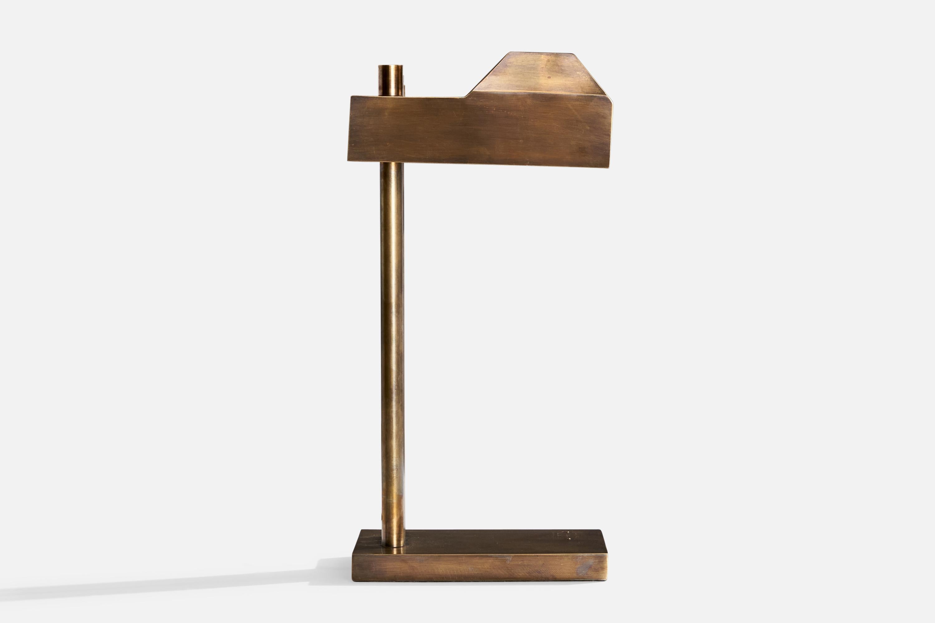 A brass table lamp designed by Marcel Breuer in 1925, present example produced in Hungary, c. 1980s.

Dramatic oxidation present to brass.

Dimensions of Lamp (inches):  16.375“ H x  5.126“W x  8“ D

Bulb Specifications: E-26 Bulb

Number of Sockets