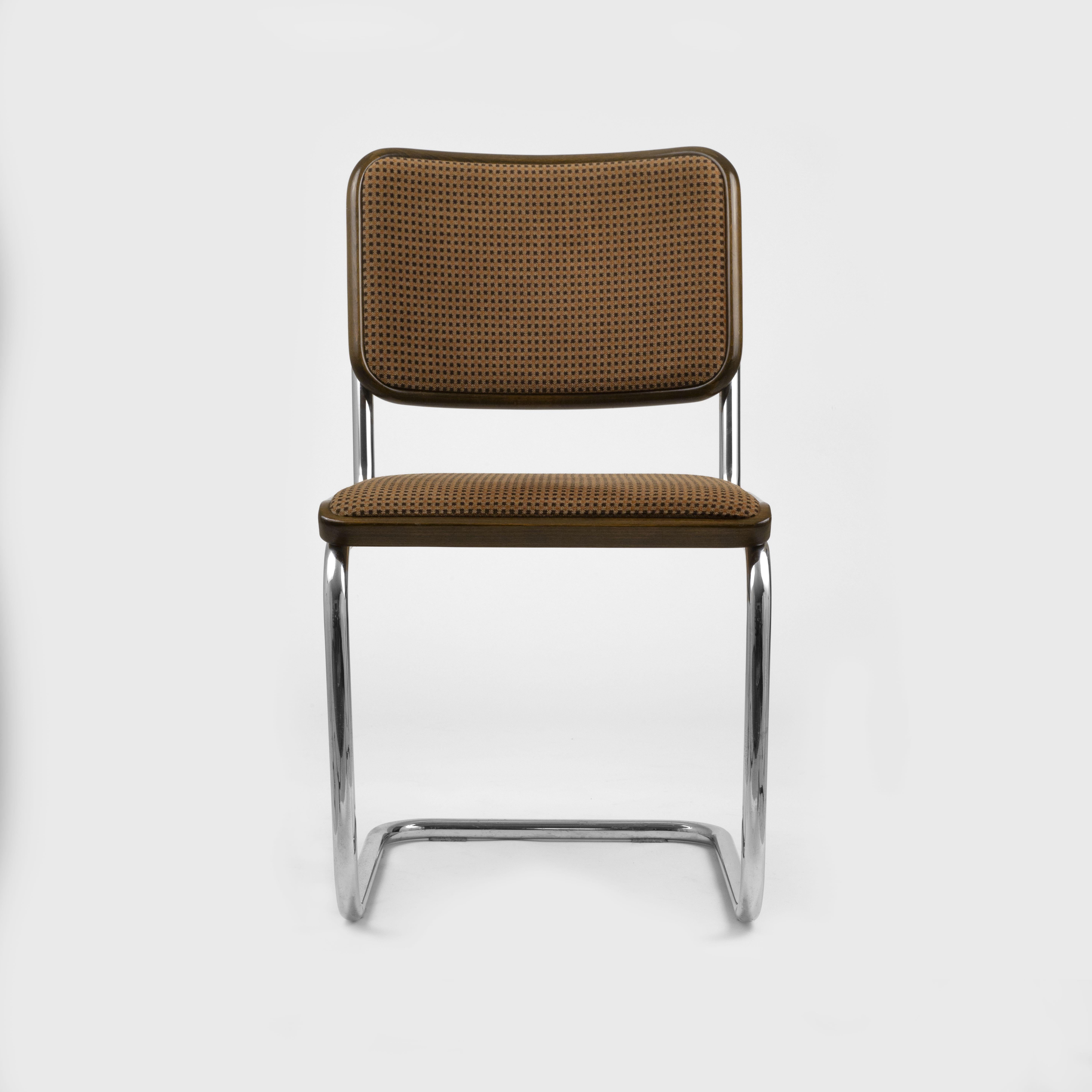 An original set of 4 Marcel Breuer Cesca chairs produced by Thonet. These are an uncommon finish color and retain original vintage velvet custom upholstery that mimics the look of caning while adding to the comfort and durability of this classic