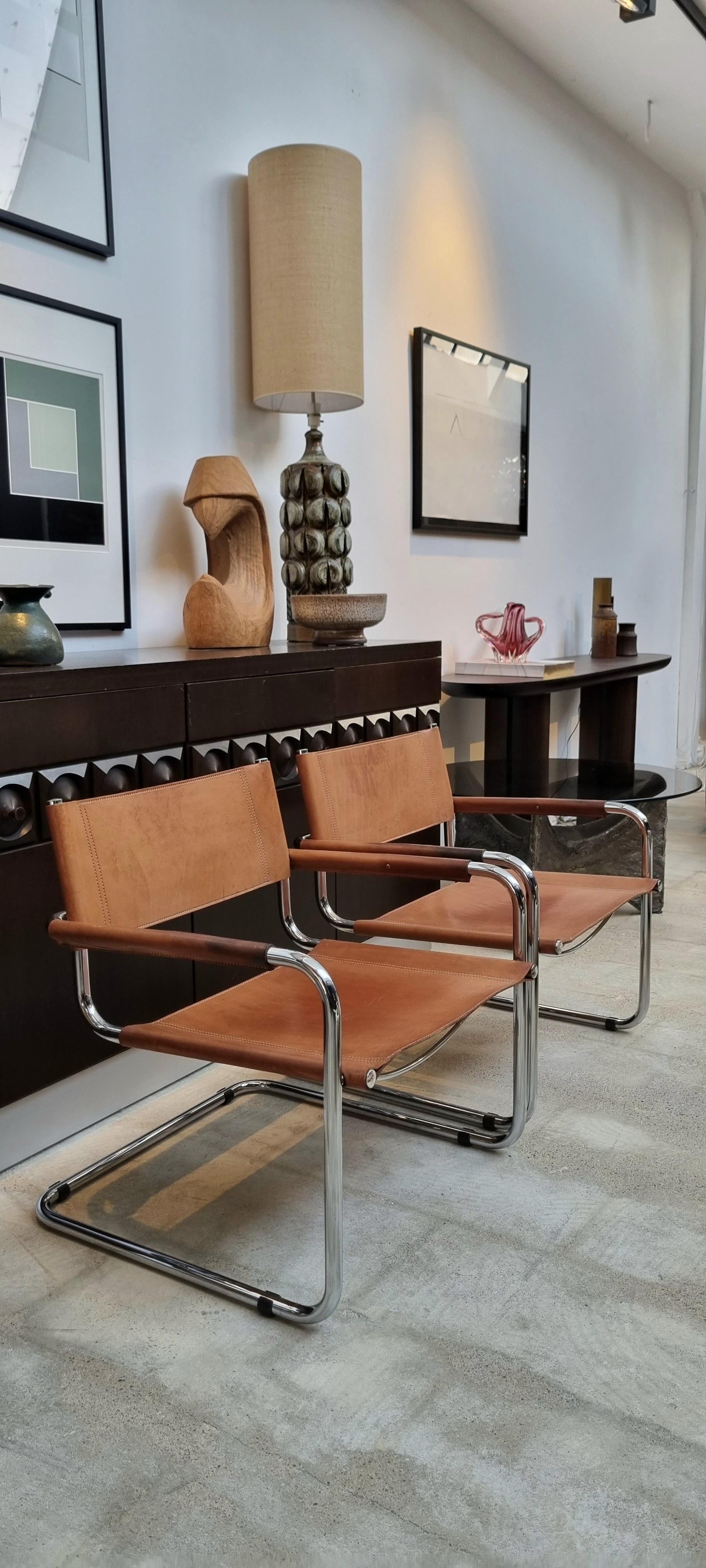 Early 20th century designed lounge chair by Marcel Breuer featuring a cantilever chrome and tan leather lounge chair.

The chair is presented in very good vintage condition with marks and patina to the leather, as shown, here and there commensurate