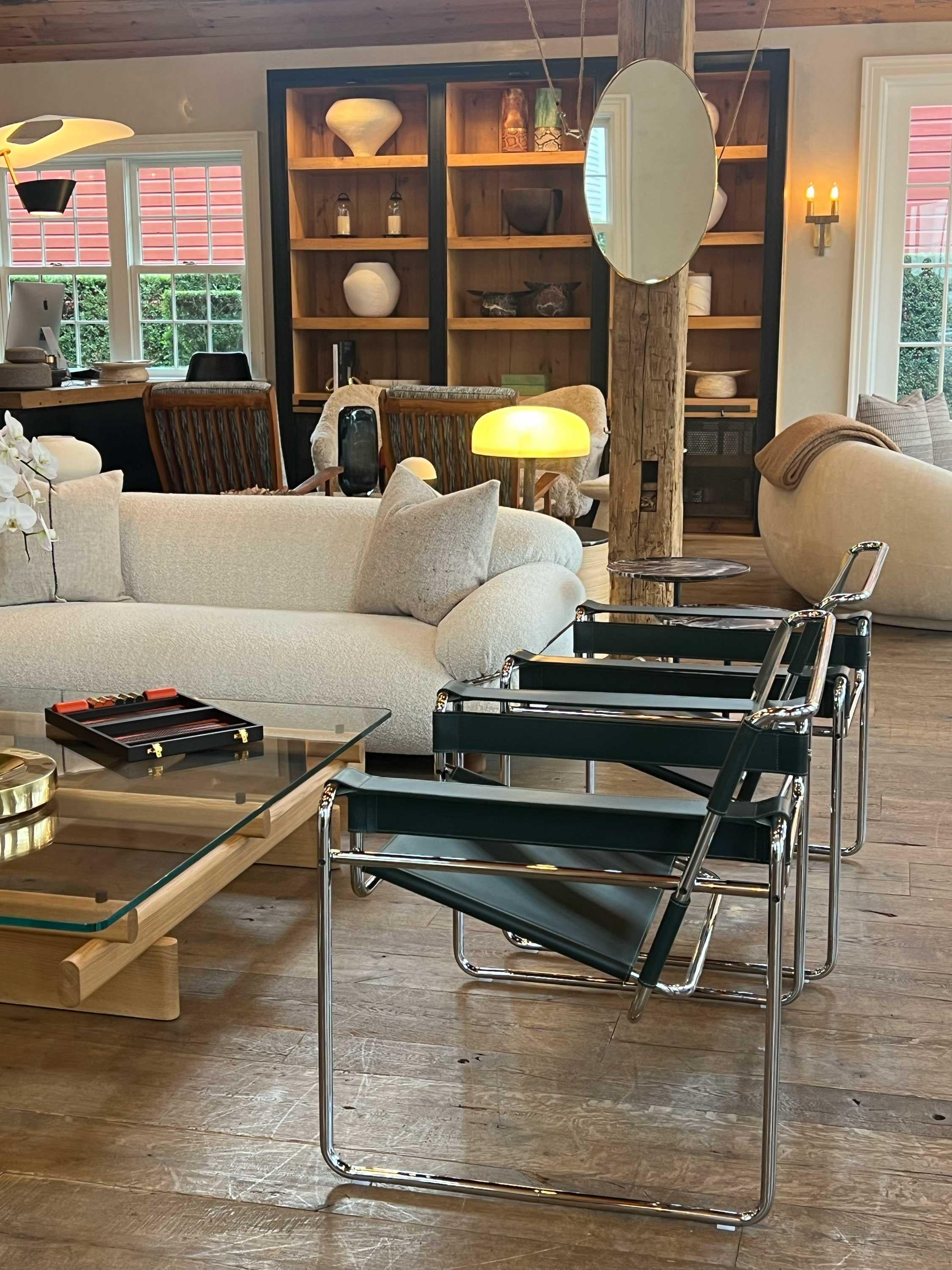The classic Marcel Breuer Wassily Chair designed by Knoll is an iconic staple in home décor. Crafted in Military Green Belting Leather with a stainless steel frame, this timeless piece has durable lumbar and armrest support for optimal comfort and