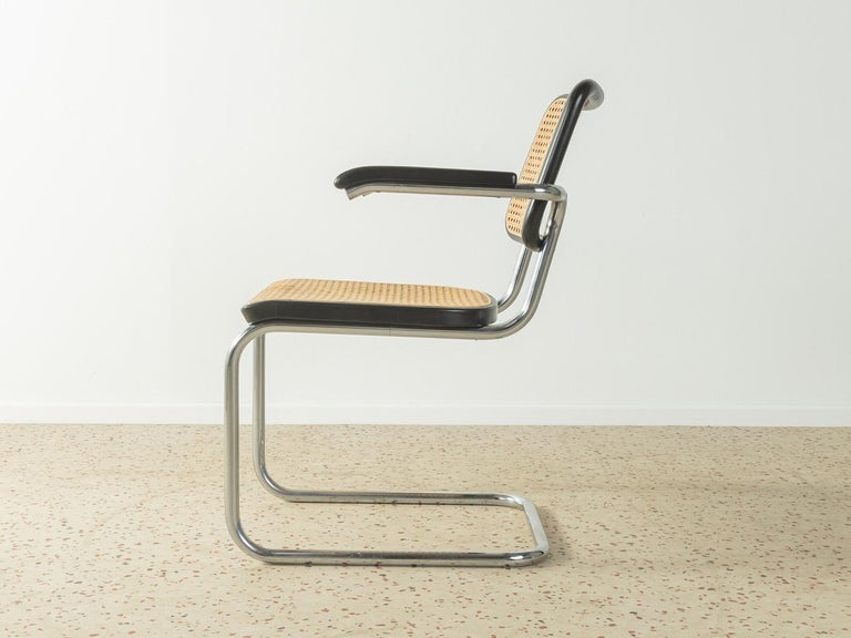 Legendary tubular steel chair, model S 64, designed by Marcel Breuer for Thonet (1928). Solid frame made of chromed tubular steel. The seat and backrest are covered with the original 