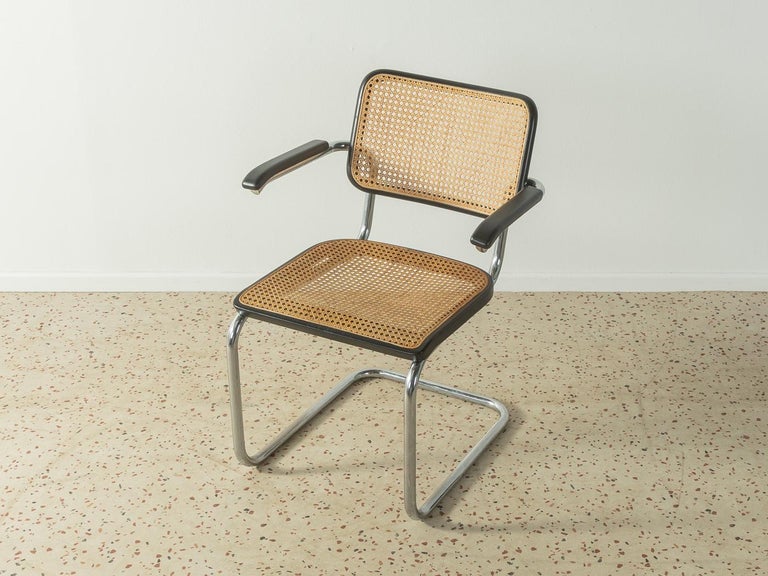 Legendary tubular steel chair, model S 64, designed by Marcel Breuer for Thonet (1928). Solid frame made of chromed tubular steel. The seat and backrest are covered with the original 