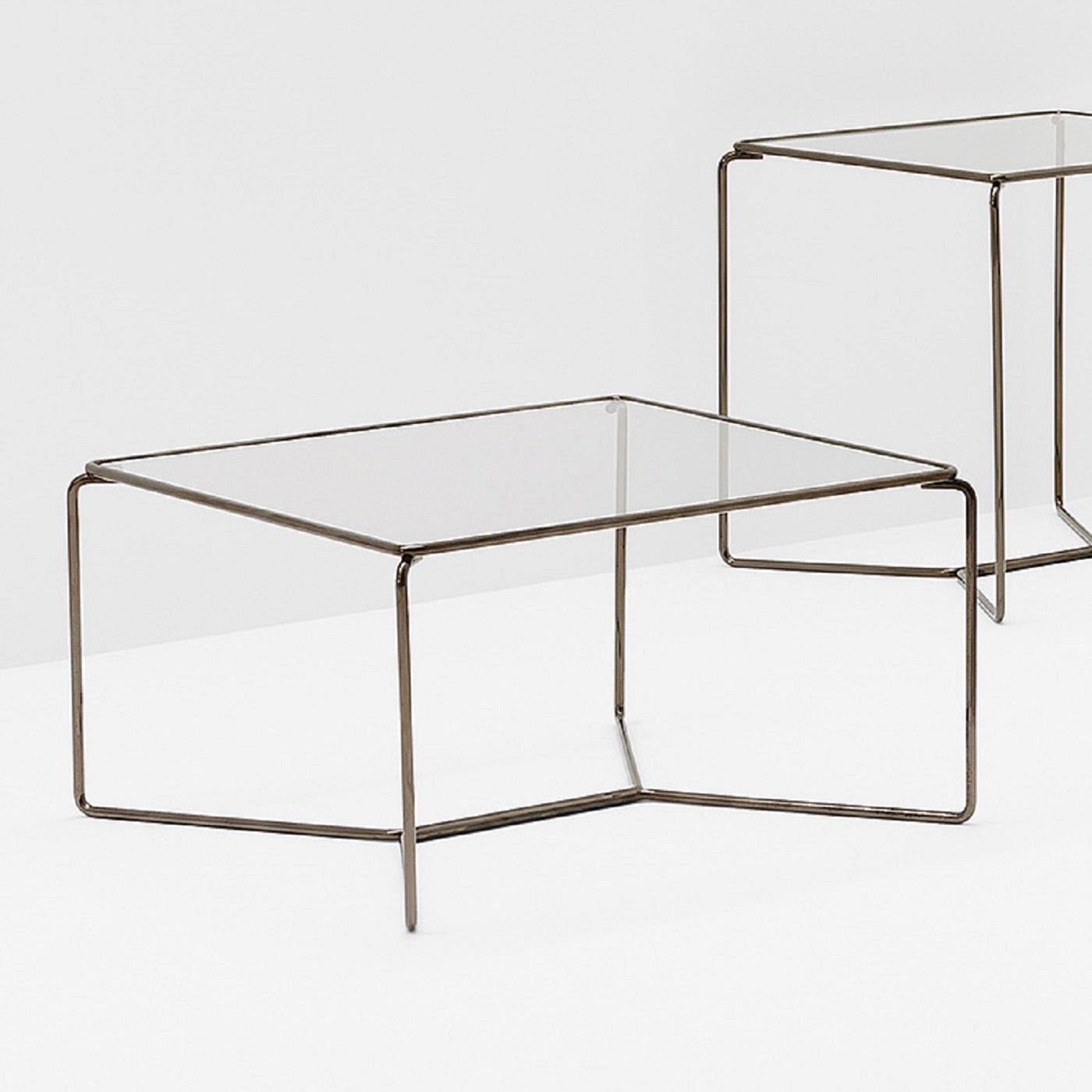 With a clean minimalist design, the superb Marcel Coffee Table is a stylish revisitation of a last century classic. Available in carbon steel with an extra clear glass top.