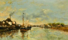 MARCEL DEBUT (1865-1933) FRENCH OIL, BARGES MOORED ON A RIVER WITH BUILDINGS