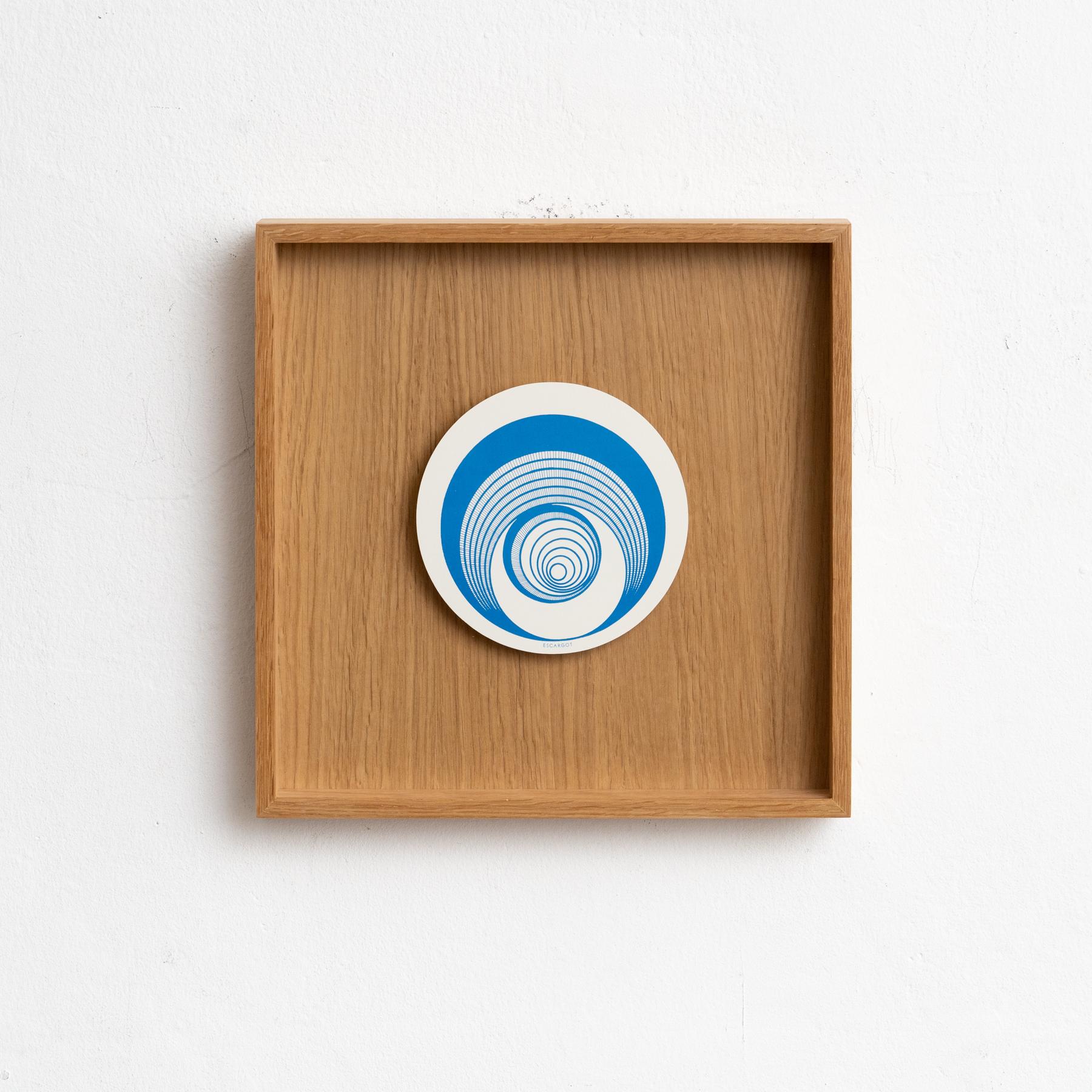Marcel Duchamp Framed Rotorelief.

Blue and White Rotorelief Model Escargot.

Edited by Walther König Series 133, Germany in 1987.

Framed Artwork in Wood.

Henri-Robert-Marcel Duchamp (French 28 July 1887–2 October 1968) was a French, naturalized
