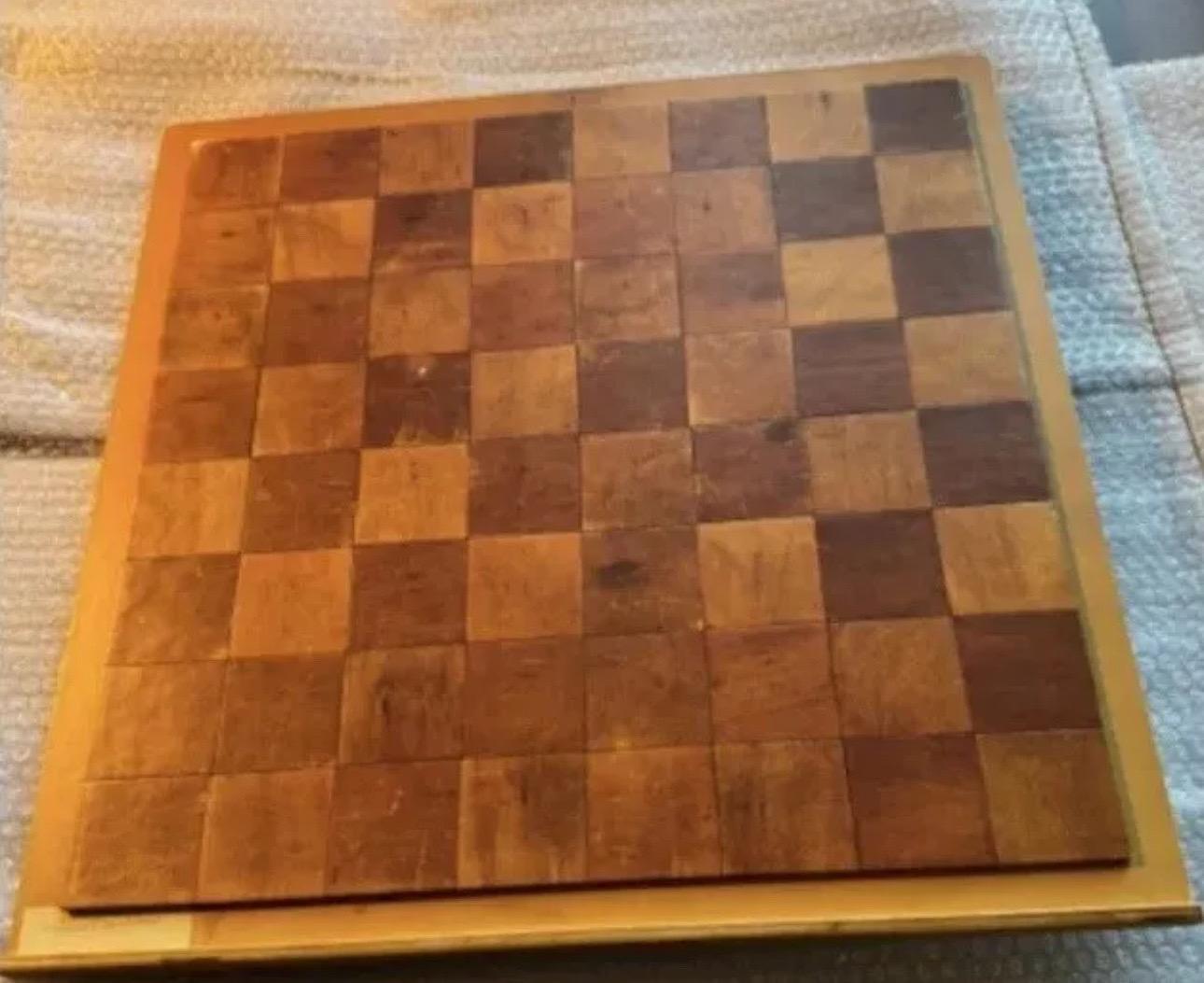 A rare and vintage Marcel Duchamp (1887-1968) Chessboard art set made in 1991 composed of a wood box reproducing the artist’s Mental Chess Board from 1937 and containing an exhibition catalog along with a portfolio of documents and related
