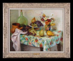 Bodegón de frutas, flores y jarrones sobre una mesa, de Marcel Dyf. Óleo sobre lienzo