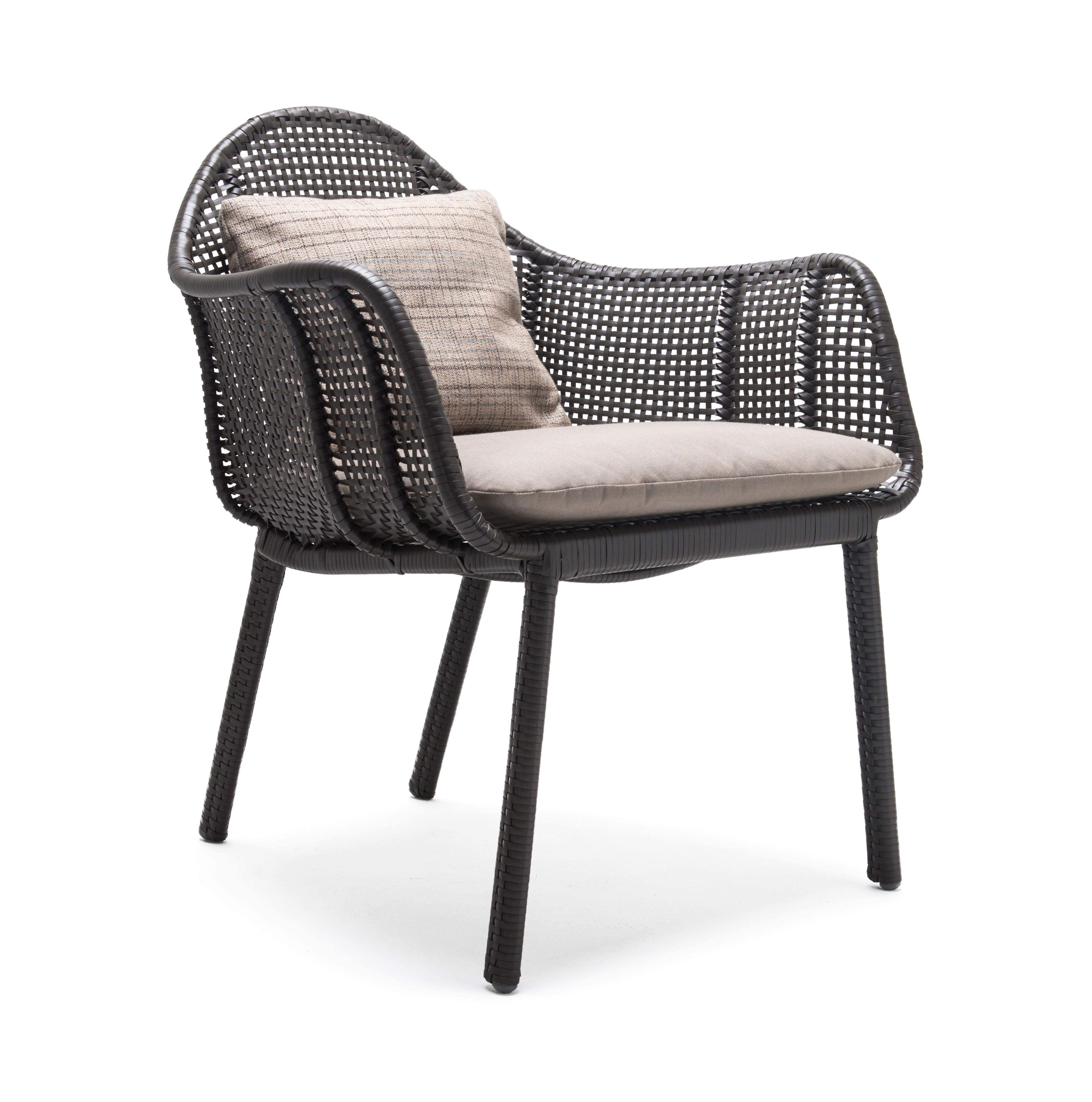 Marcel easy armchair by Kenneth Cobonpue.
Materials: Polyethelene, Aluminum. 
Dimensions: 65cm x 69cm x H 80cm 

The Marcel collection complements any outdoor space with pieces that are made for comfort. Made of polyethylene and steel, this
