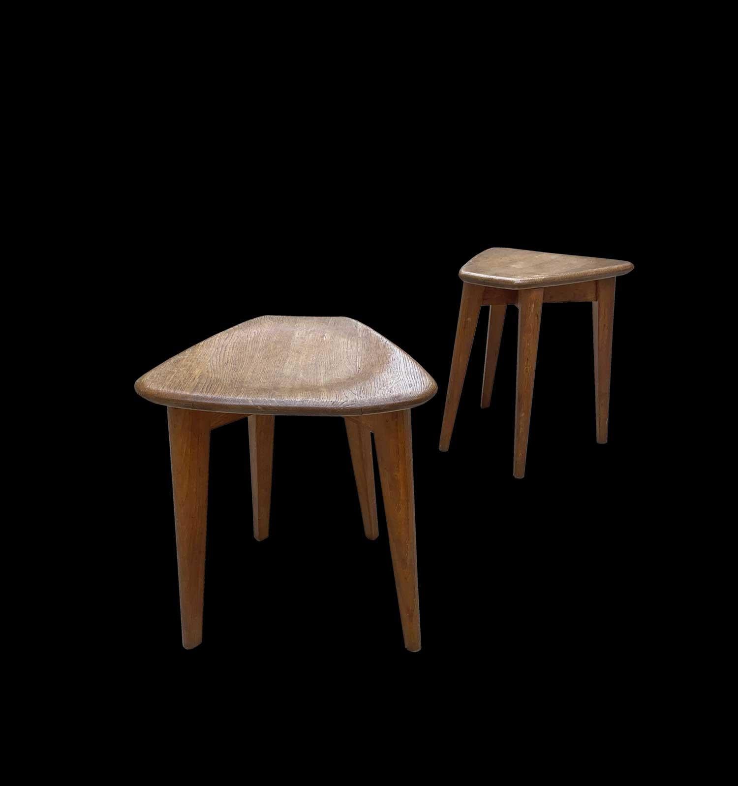 Pair of oak stools with 4 legs by Marcel Gascoin. 
Model from the reconstruction furniture series. Circa 1950
H 42 cm W 38 cm D 36 cm