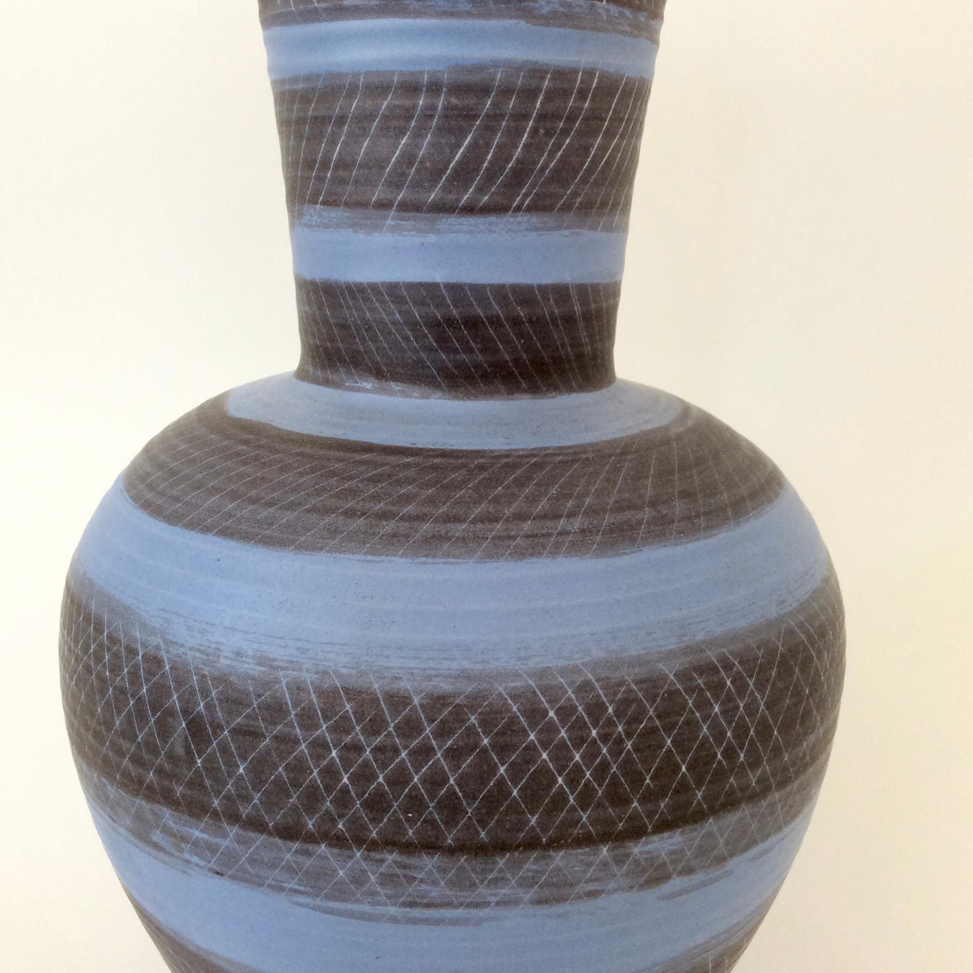 Rare Marcel Guillot vase, circa 1950, France.
Luminous blue and black ceramic.
Signed underneath.
Dimensions: 36 cm height, diameter 23 cm.
Good condition.
 All purchases are covered by our Buyer Protection Guarantee.
This item can be returned