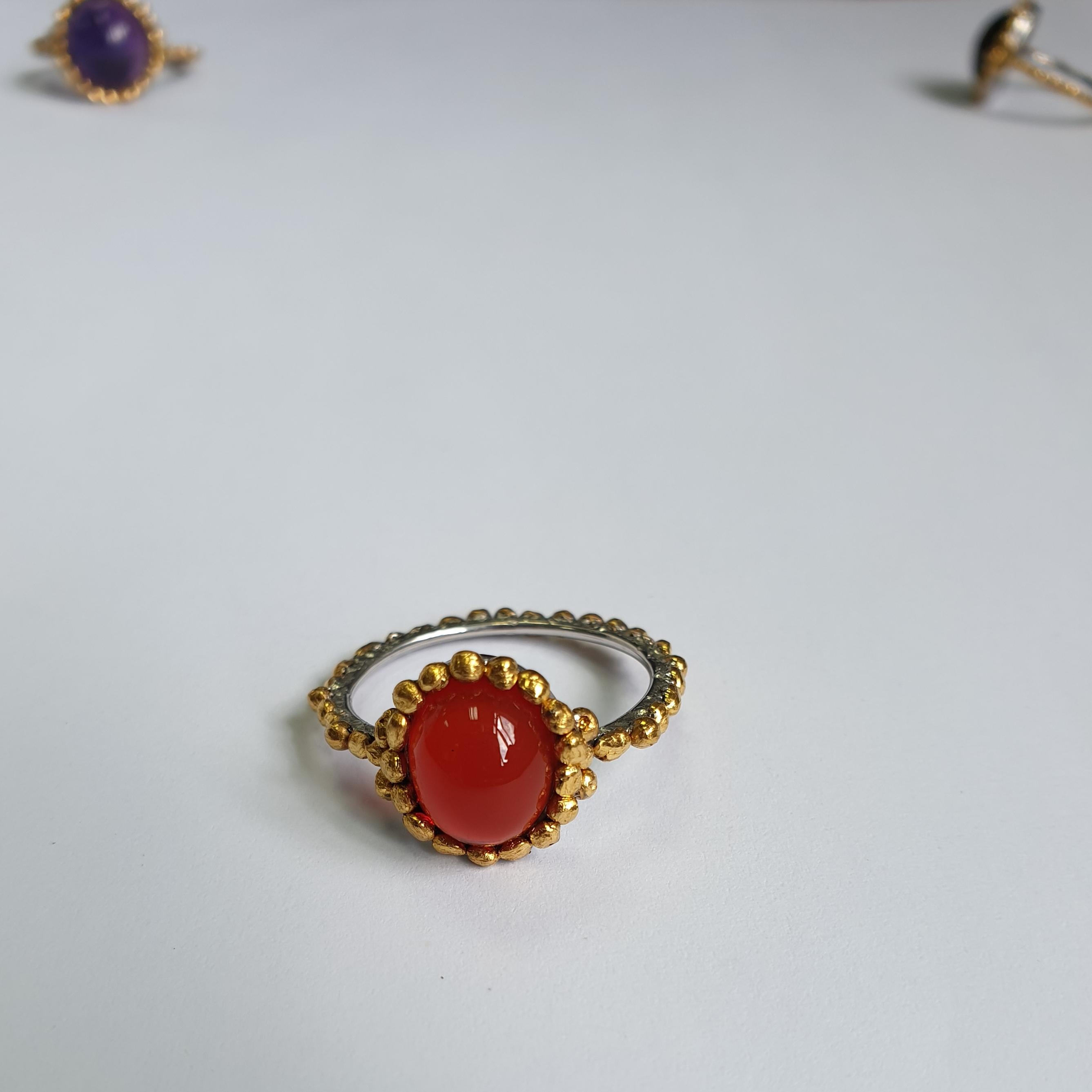 Modern Oval Fire Opal Ring Made in Platinum and 24 Karat Gold For Sale