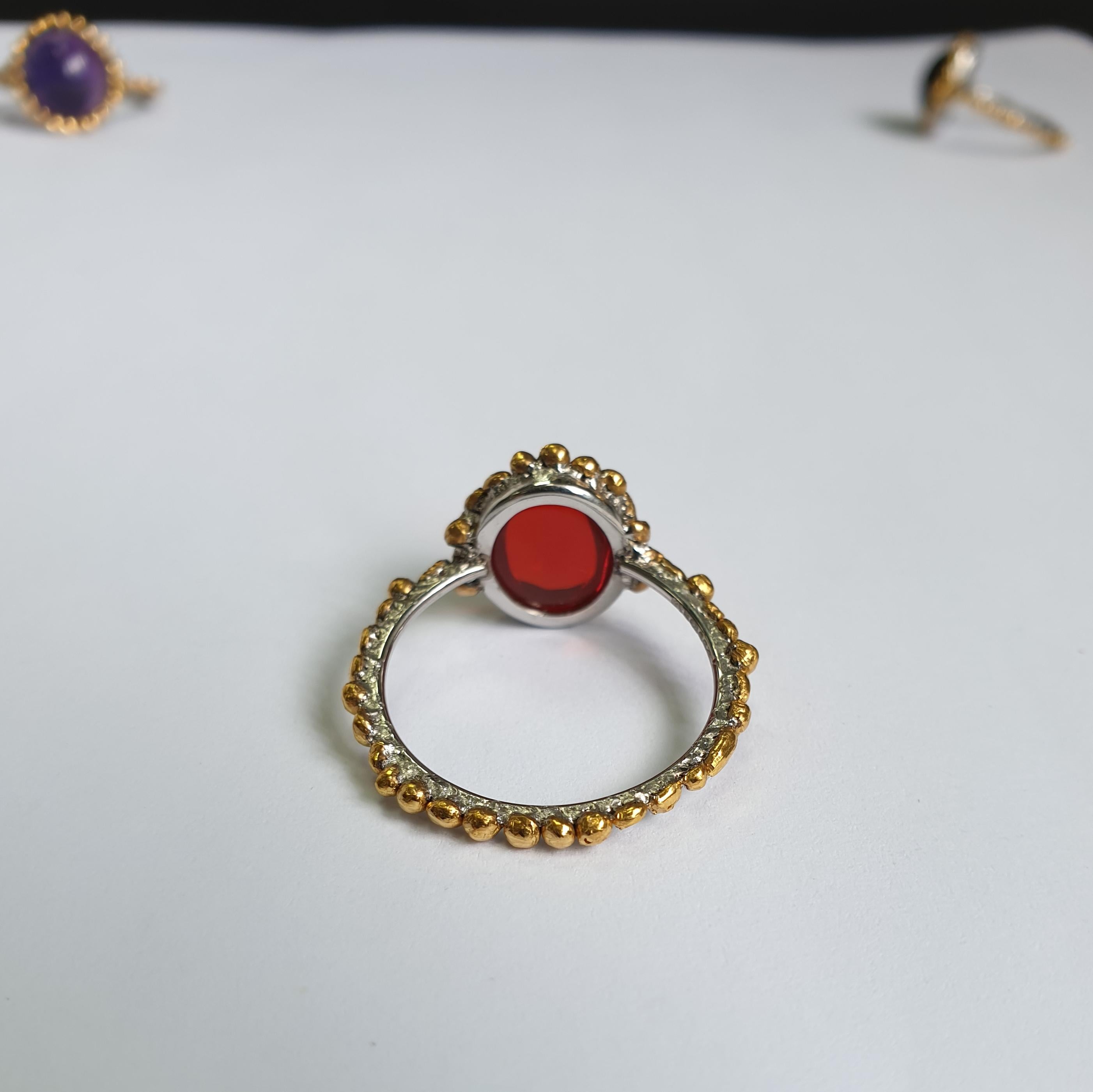 Women's Oval Fire Opal Ring Made in Platinum and 24 Karat Gold For Sale