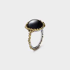 Round Onyx Platinum and 24 Karat Gold Ring