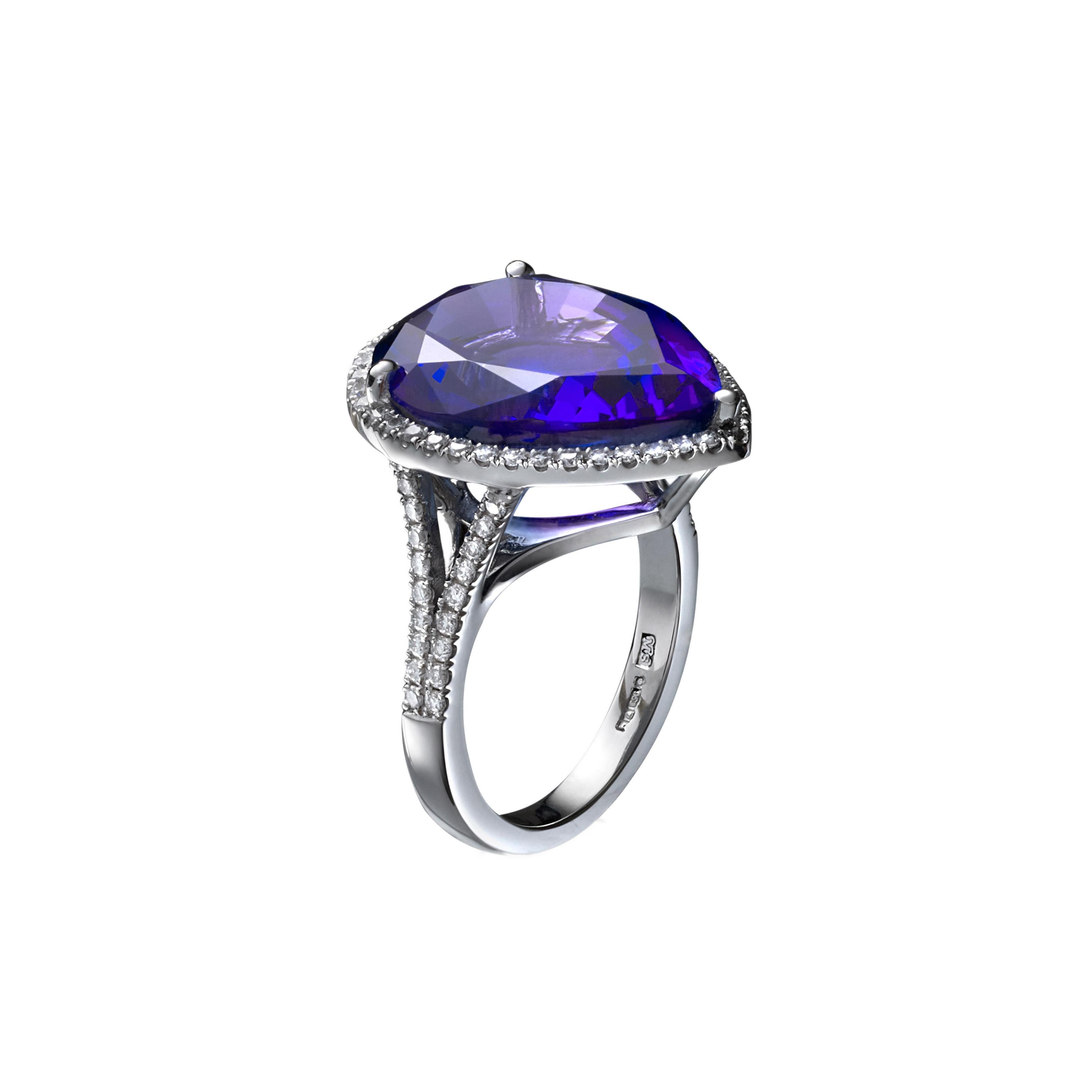 Rare blue 10.35 Carat Pear Shaped Tanzanite Diamond And Platinum Engagement Ring. This stunning Tanzanite draws your attention with its rare marvelous velvety blue colour and brightness. Crafted in platinum for beauty strength and durability,