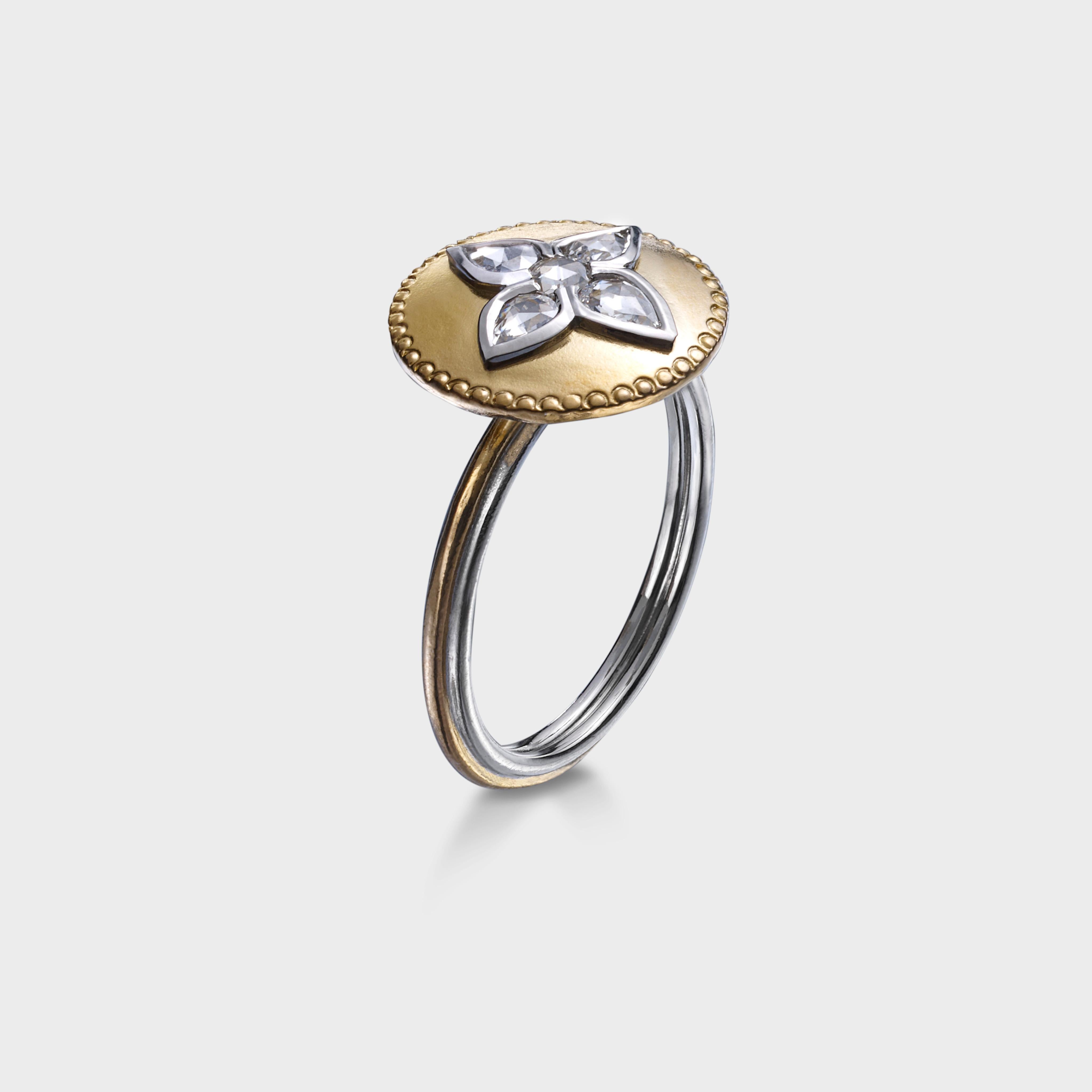 Part of our L'or collection, this ring is handmade in 24 karat gold and platinum.   This gives it a lush and luxurious feel, making it irresistible to both senses, touch and sight.  This collection is inspired by antiquity and presented in a modern