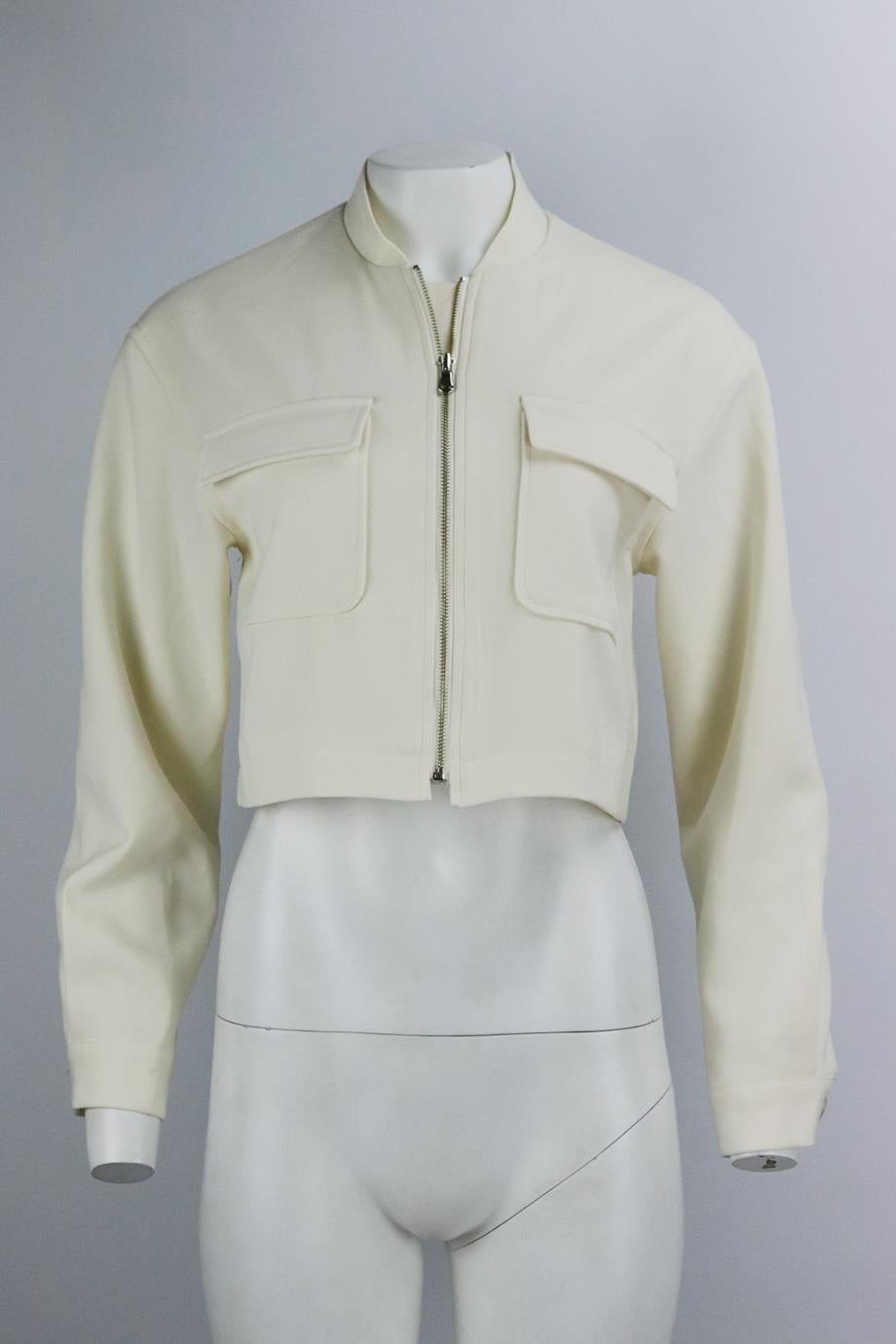 Marcéla London cropped twill bomber jacket. White. Long sleeve, v-neck. Zip fastening at front. 97% Polyester, 3% spandex. Size: One Size. Shoulder to shoulder: 18.2 in. Bust: 40.4 in. Waist: 41 in. Length: 17 in
