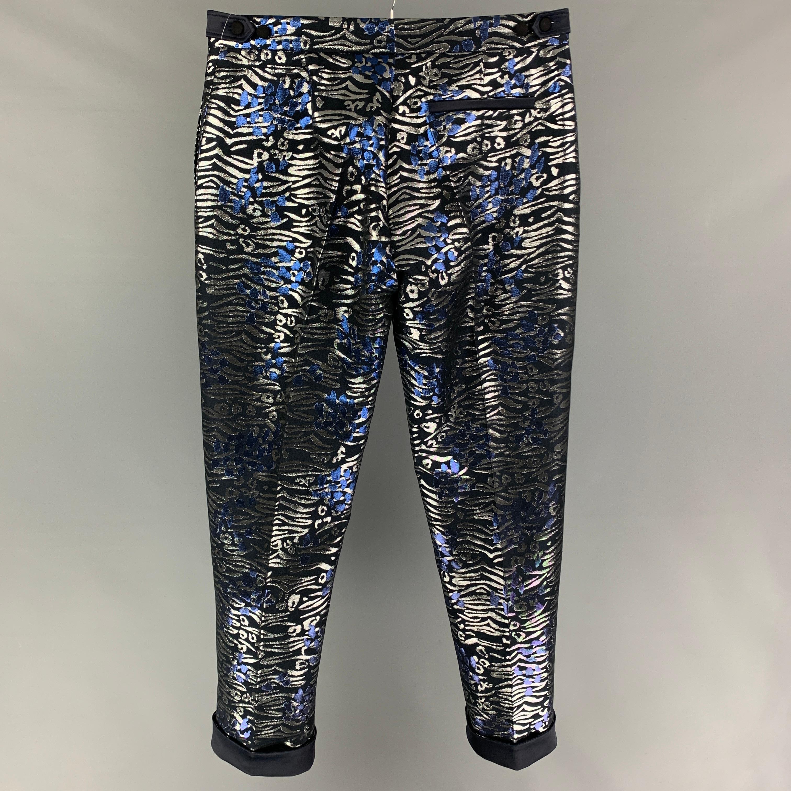 MARCELL VON BERLIN dress pants comes in a multi-color metallic print polyester / cotton featuring a flat front, cuffed leg, side tabs, and a zip fly closure. 

New With Tags. 
Marked: EU 48 / US 38 / UK 38 / FR 48

Measurements:

Waist: 34 in.
Rise: