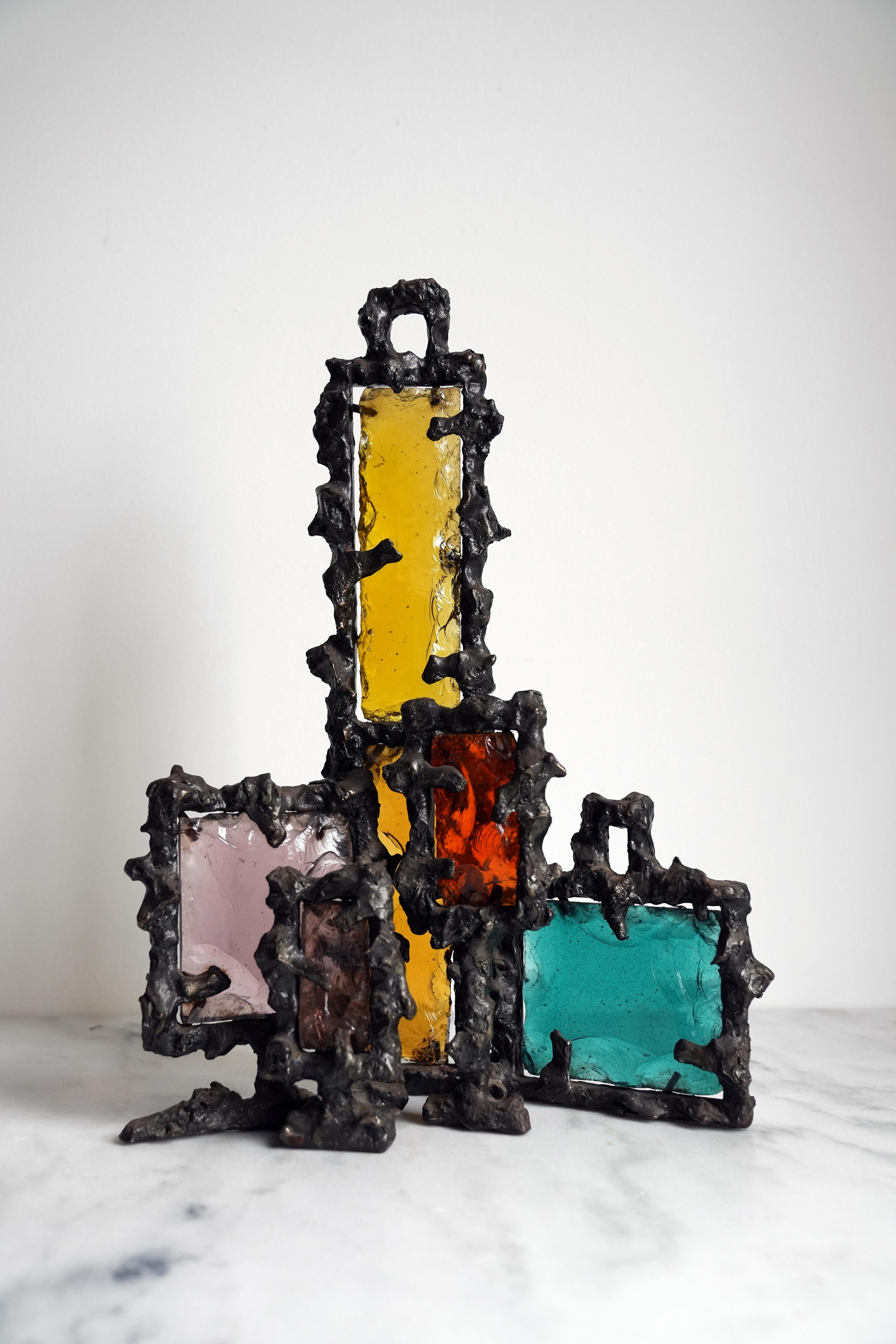 Marcello Fantoni Brutalist sculpture.
Iron and colored glass.