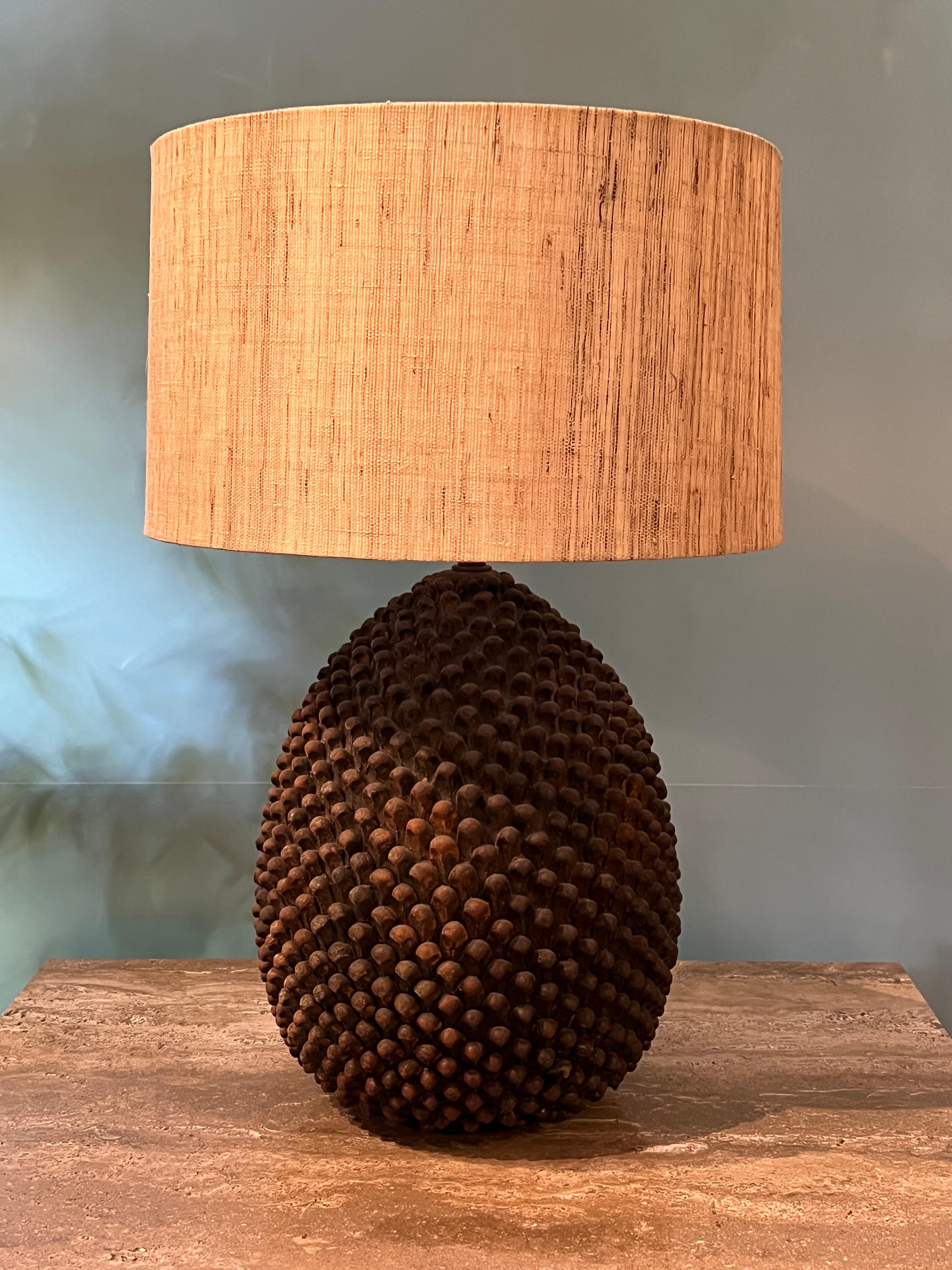 A large ceramic pinecone lamp by Marcello Fantoni. 
Shade not included.