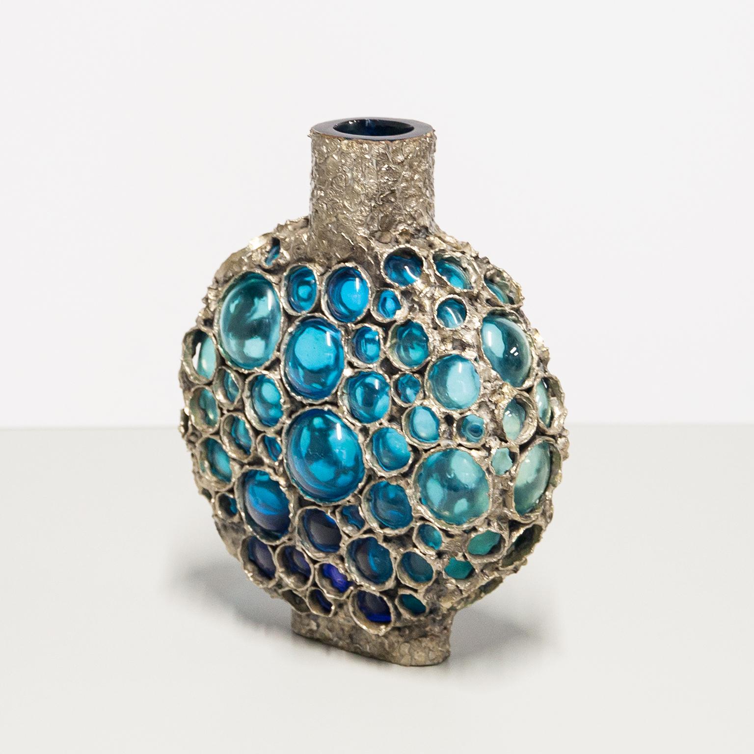 Marcello Fantoni and Gian Paolo blown glass and fused metal vase, having an organic form executed in blueglass with cold painted metal accents.