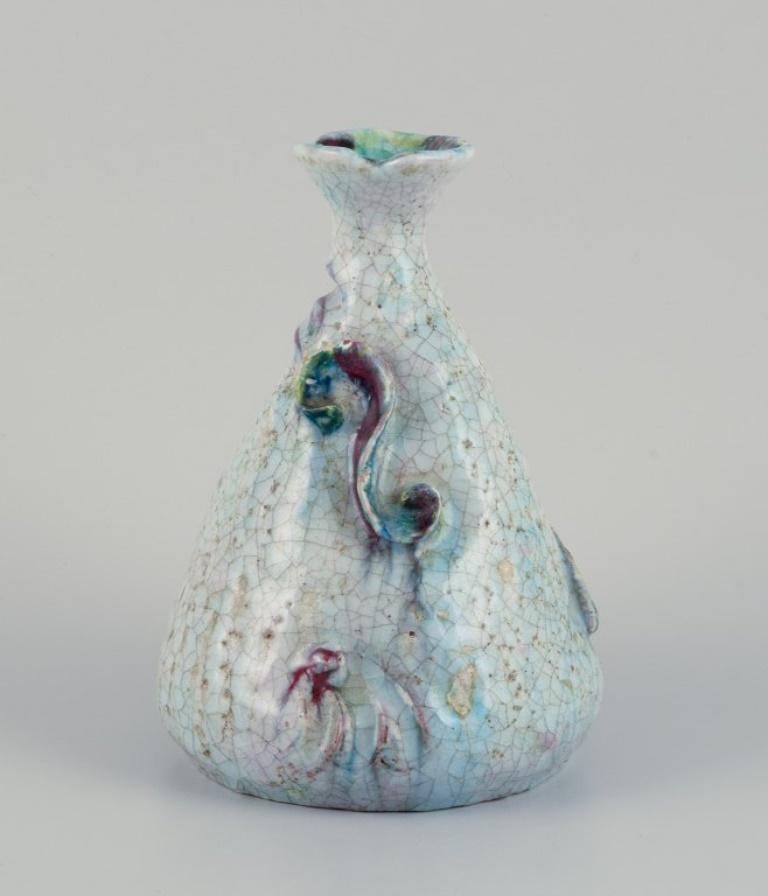 Marcello Fantoni (1915-2011), Italian ceramist. 
Large unique ceramic vase with fish in relief. Polychrome glaze.
Signed.
1960s/70s.
Perfect condition with natural craquelure in the glaze.
Dimensions: Height 21.0 cm x Diameter 14.5 cm.