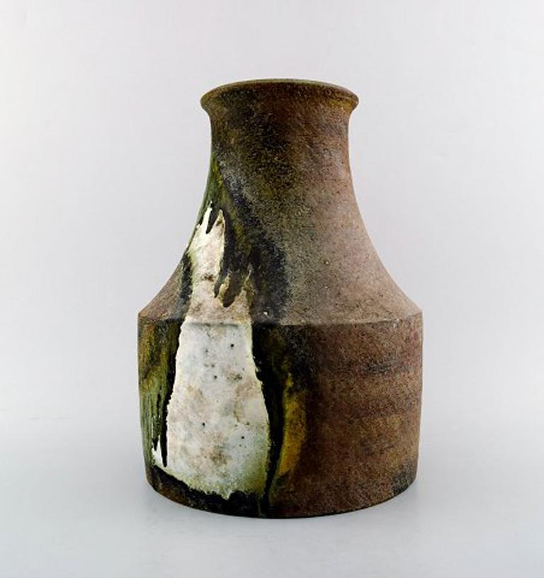 Marcello Fantoni, Italy. Large ceramic vase, glaze in green and brown tones.
1970s.
In perfect condition.
Measures: 29 cm x 20 cm.
Stamped.