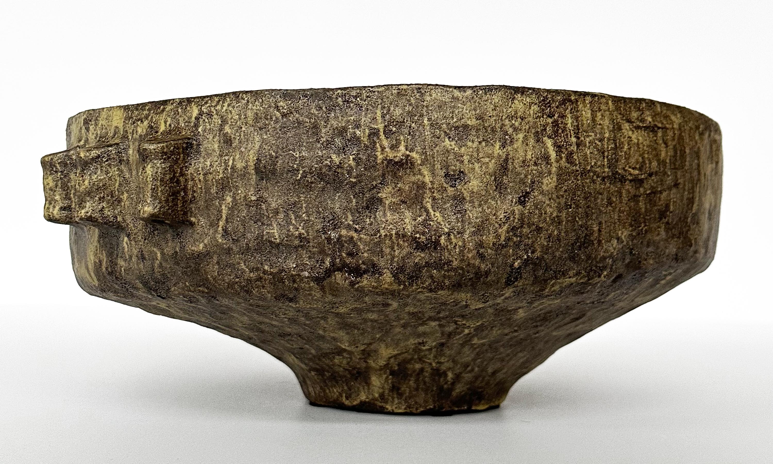 Marcello Fantoni (1915 - 2011) large ceramic centerpiece bowl, circa 1950s. A rare and uncommon design. This work draws direct inspiration from ancient Etruscan pottery which Fantoni's pieces were often influenced by. The bowl is an irregular