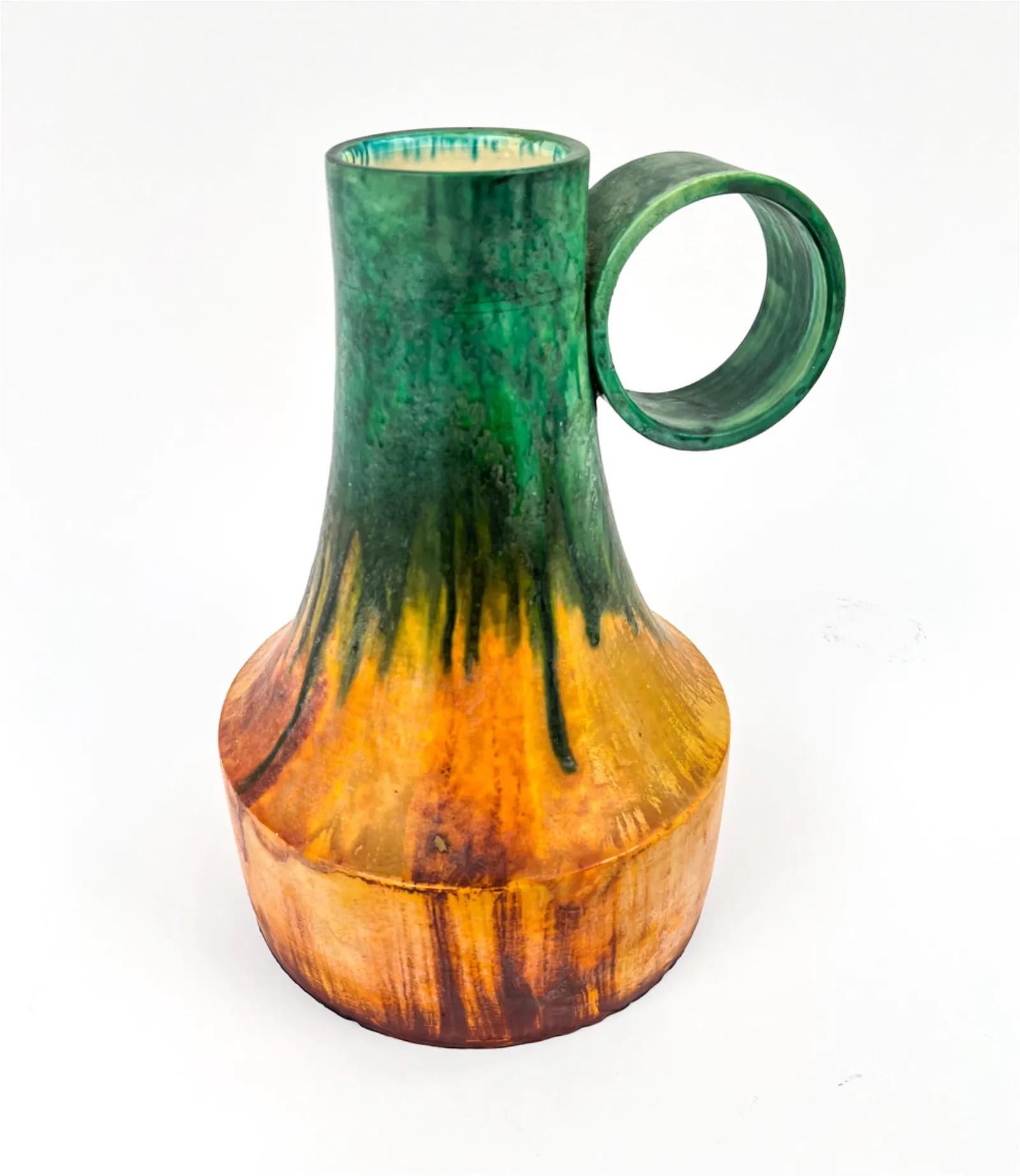 Marcello Fantoni Monumental Tuscan Ewer, Ceramic Vase or Pitcher, Italy In orange, green flambé glaze.  Extremely rare form and scale with stunning large-scale handle. Signed underneath: Fantoni, Italy. Numbered 03005 underneath. Dimensions: H