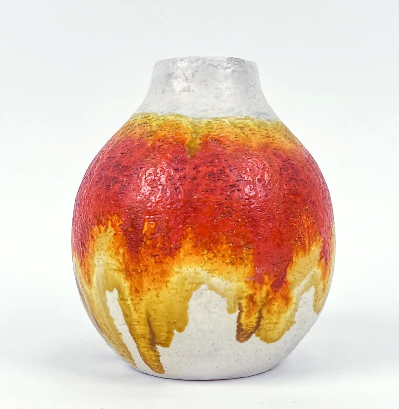 Signed underneath: Fantoni, Italy. In red, white, and yellow glaze. Dimensions: H 7