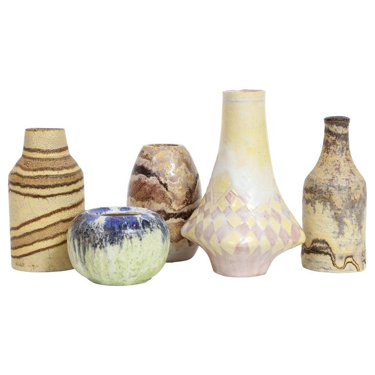 Italian artist Marcello Fantoni's Small Ceramic Vases are being offered as a collection. These pieces were acquired directly from the artist by the seller, who was a personal friend of Marcello Fantoni. All have glazed signature to underside: