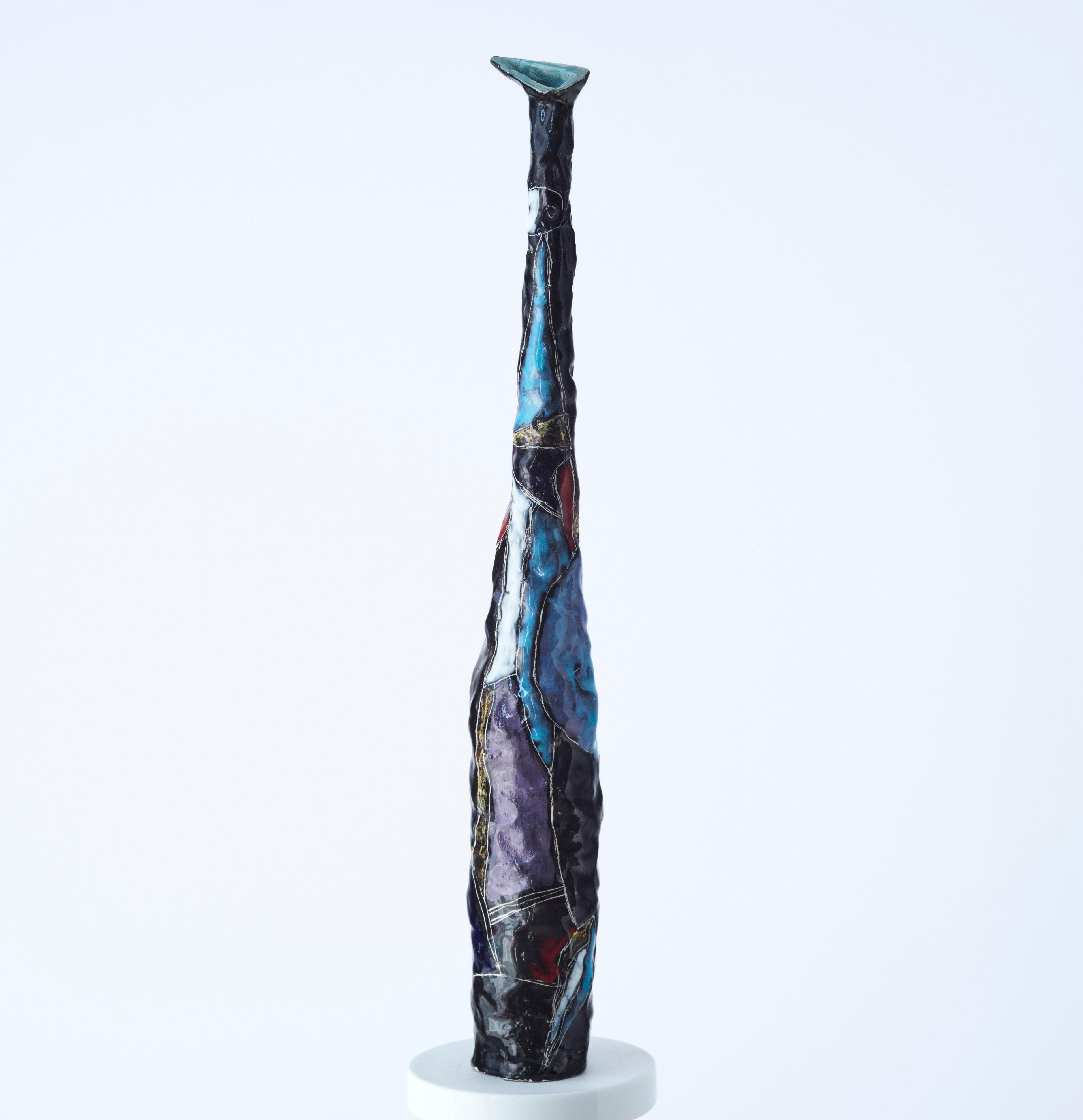 Studio ceramic vase by Marcello Fantoni. Vase in form of a bottle with triangular spout. Hand-built earthenware with shiny black glaze and multicolored decor on front. Signed underneath.
       