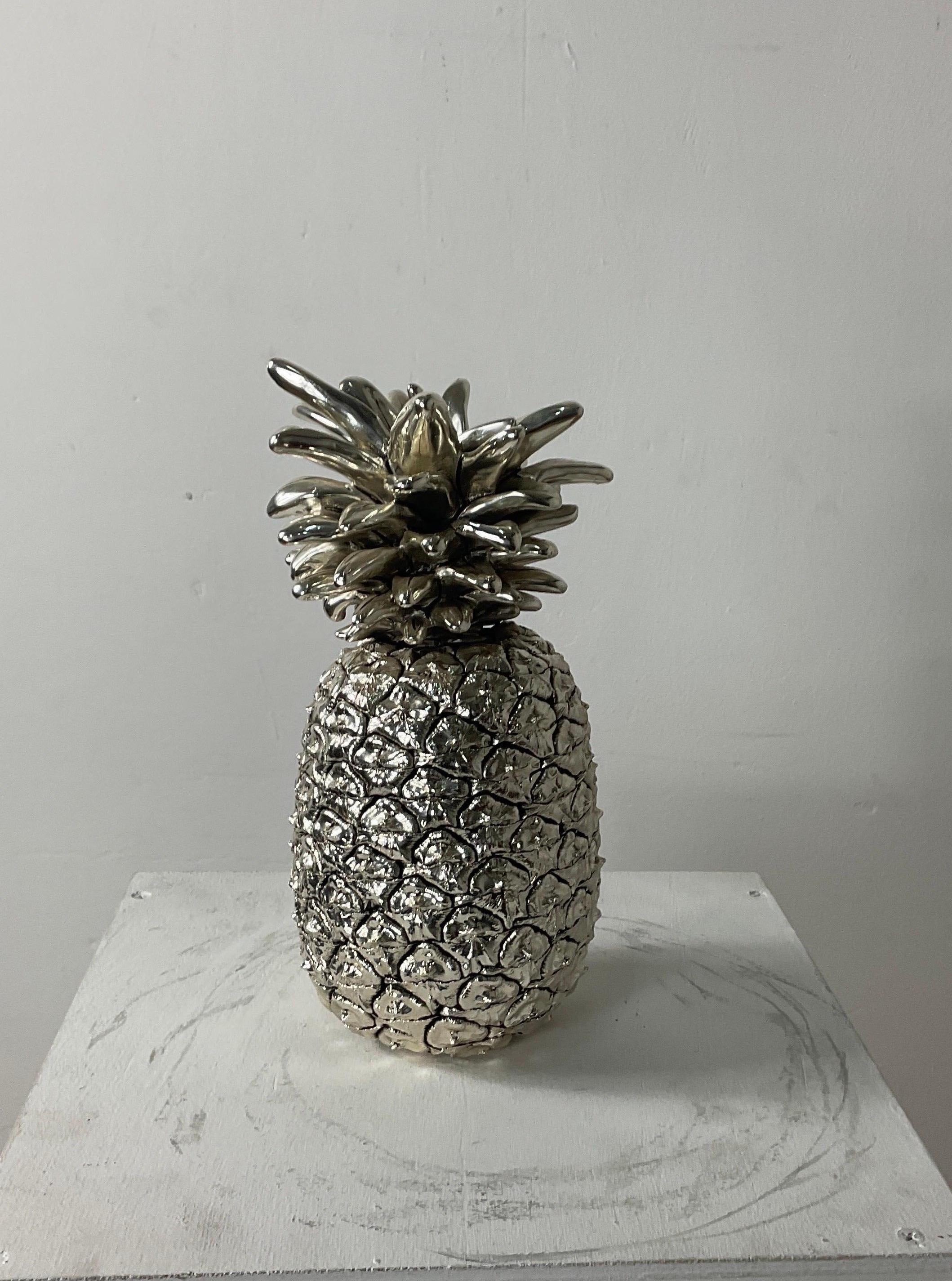 Metal foil sculpture with pineapple shape in perfect condition. Attributable to the Italian designer Marcello Giorgio. The pineapple is very detailed and realistic. 800 Laminated signed and stamped.