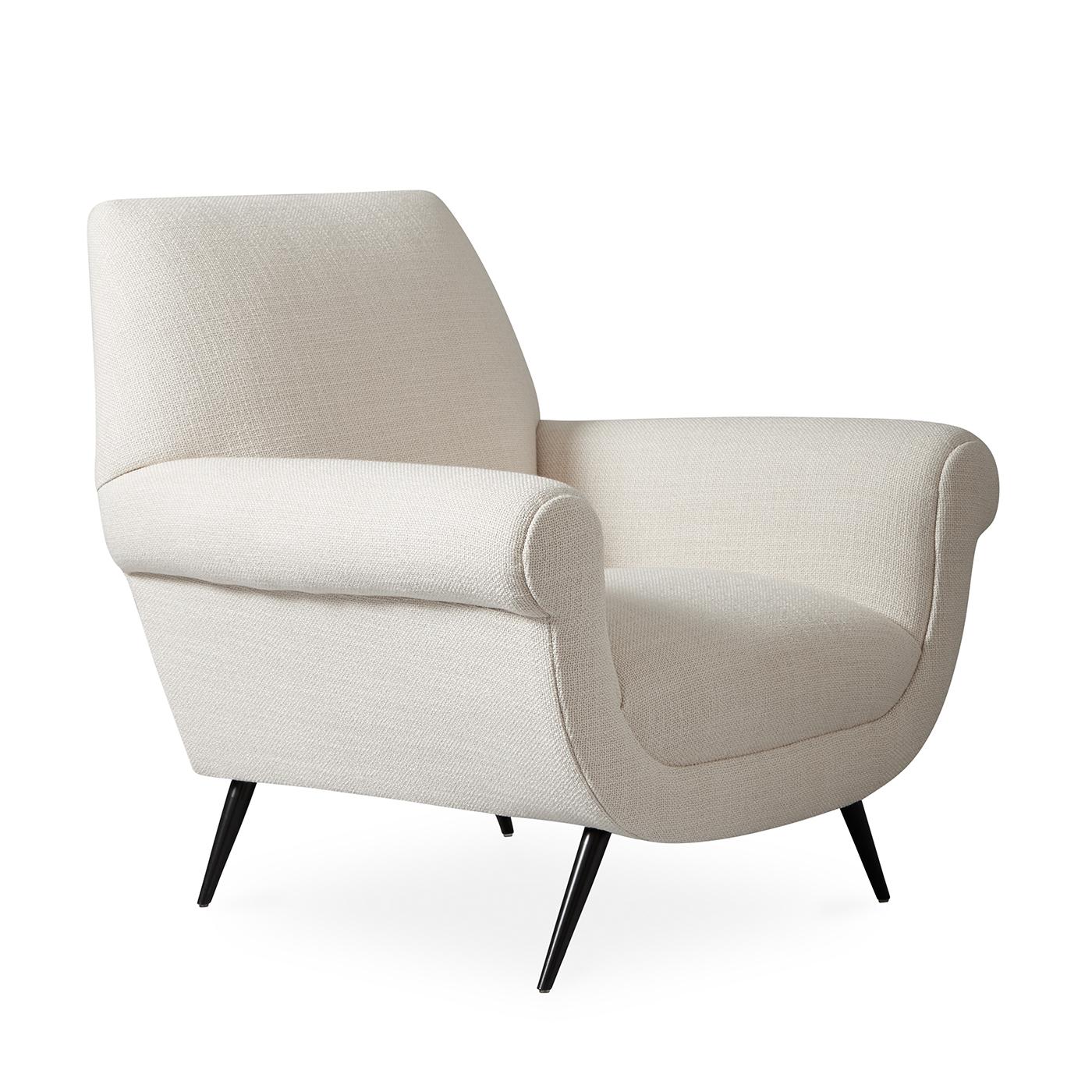 Posh Perch. With a lofty and inviting seat and a dynamic profile, our Marcello Lounge Chair channels Italian glamour. It's our pared down and posh riff on the Classic rolled armchair. The horseshoe-inspired shape cradles you chicly, while tapered