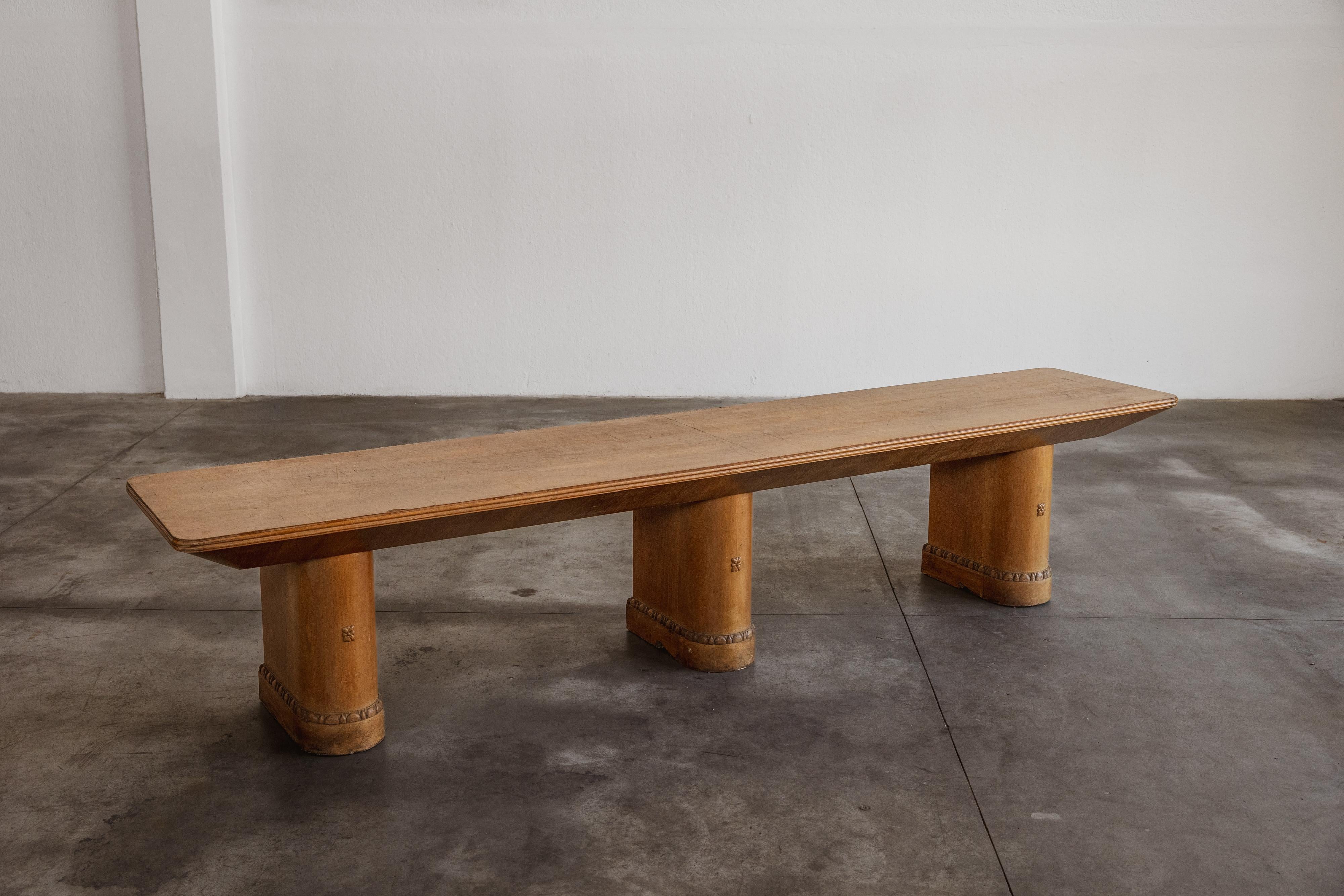 Marcello Piacentini counter table, wood, Italy, 1930s

The Marcello Piacentini table is a monumental piece that epitomizes the fusion of luxury design and architectural prowess. This table composition draws inspiration from classical Roman seats and