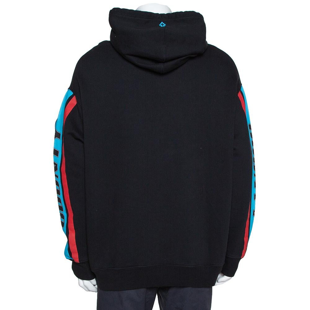 This black hoodie from Marcelo Burlon comes with colorful stripe details to light up your casual style. It is made from cotton and designed with long sleeves and two pockets. The comfortable creation will pair well with a variety of bottoms.

