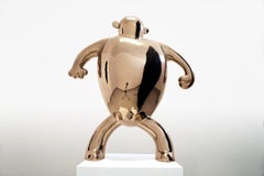 I. B. U. di Marcelo M. Burgos - scultura in bronzo lucidato, dorato, scimmia