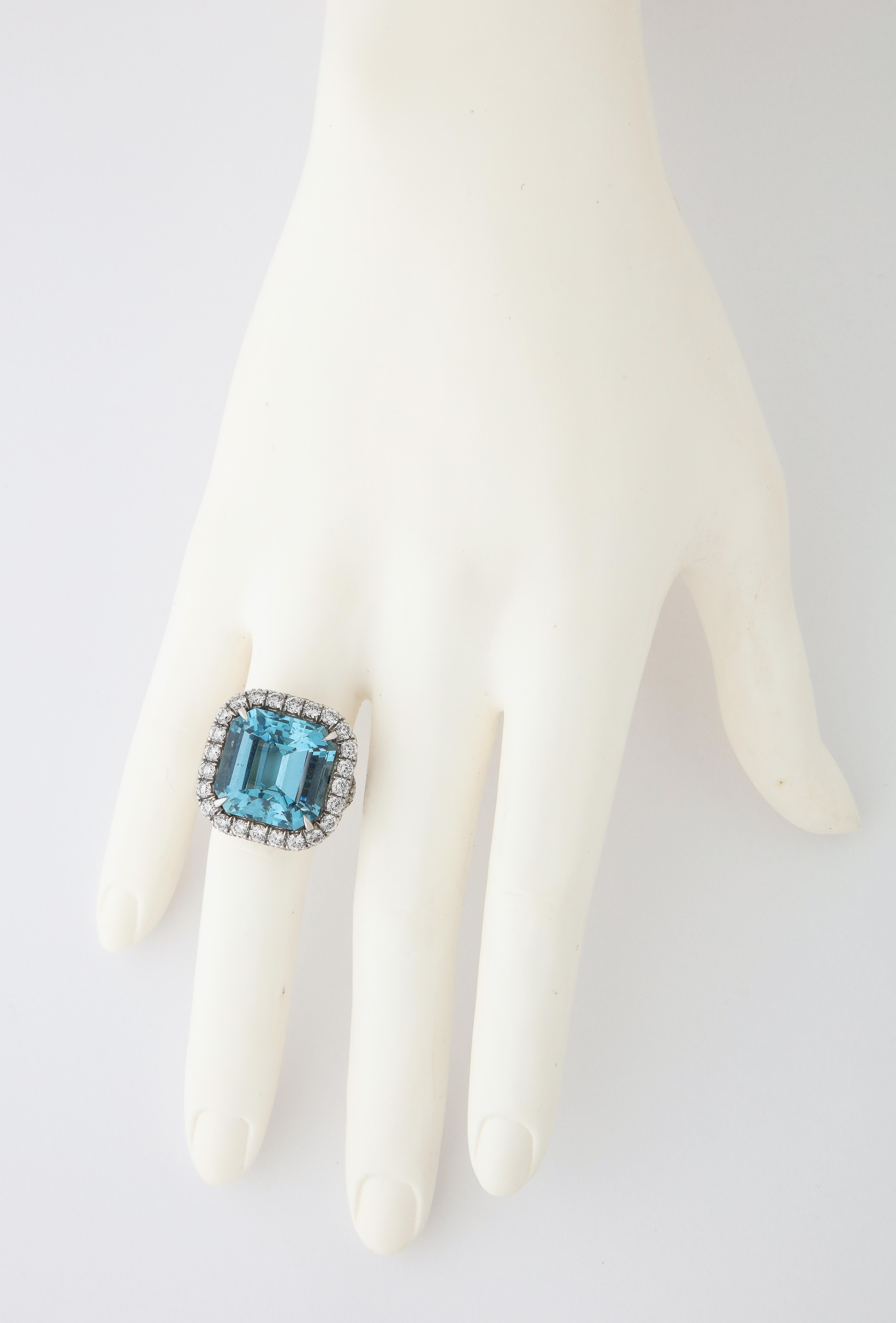 If you are looking for the best, you have found the finest, boldest aquamarine and diamond cocktail ring.

The aquamarine was cut by an expert artisan in Germany into a perfectly square emerald cut.  The stone weighs 16.44 carats and it is a rich,