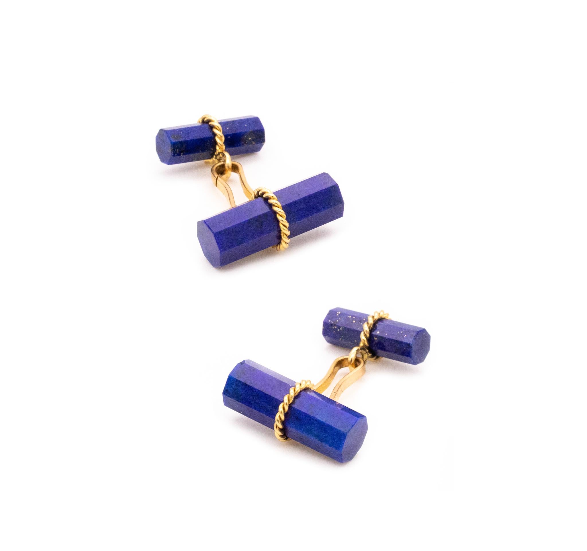 Colorful pair of cufflinks designed by Marchak Paris.

A beautiful sleek pieces created by the house of Marchak in Paris France after the war, circa 1950's. This pair of geometric cufflinks was carefully crafted with 18 karats yellow gold twisted