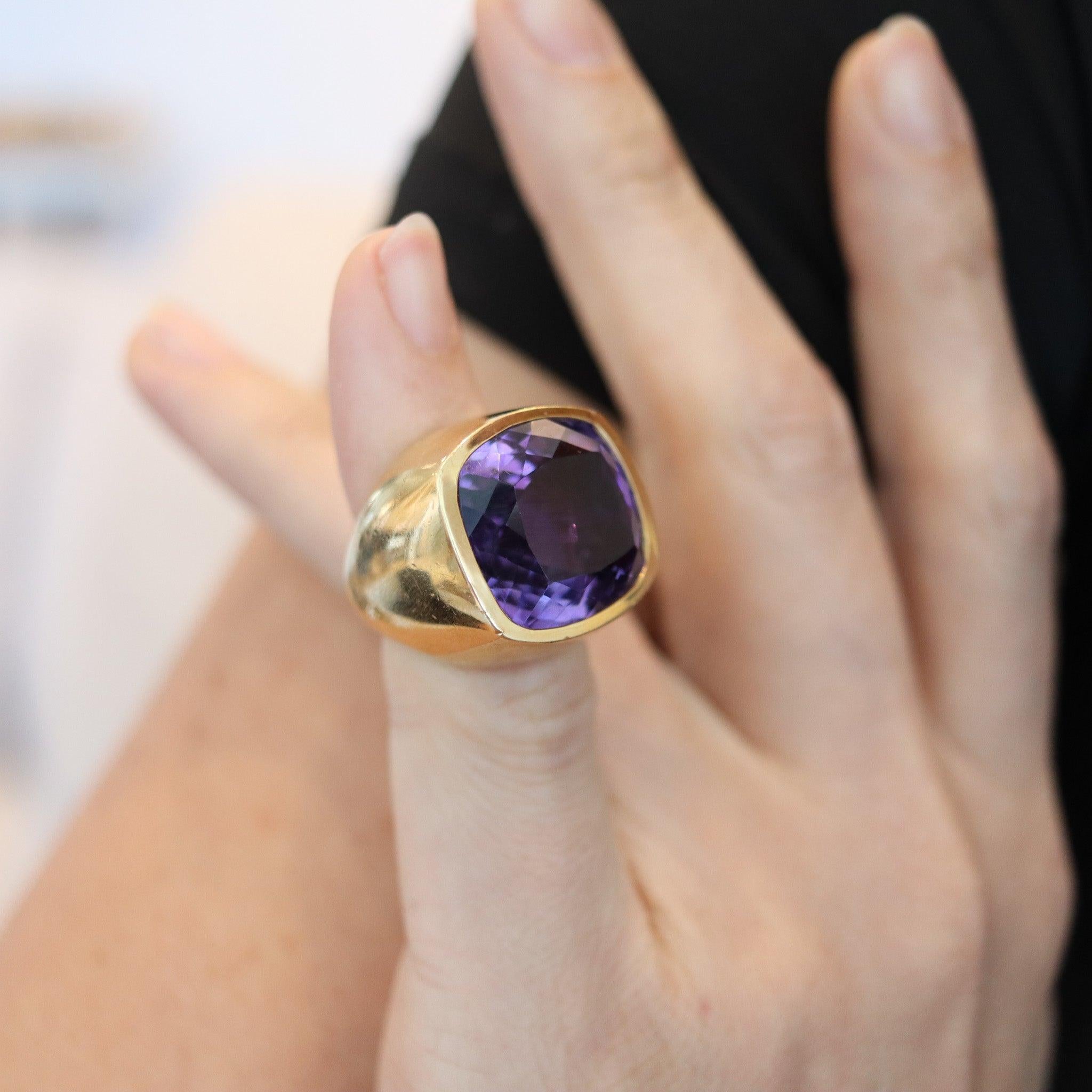 A cocktail ring band designed by Marchak Paris.

This is an absolutely stunning cocktail ring, created in Paris France by the jewelry house of Marchak, back in the 1970. The geometric ring is bold, very substantial and crafted in solid rich yellow